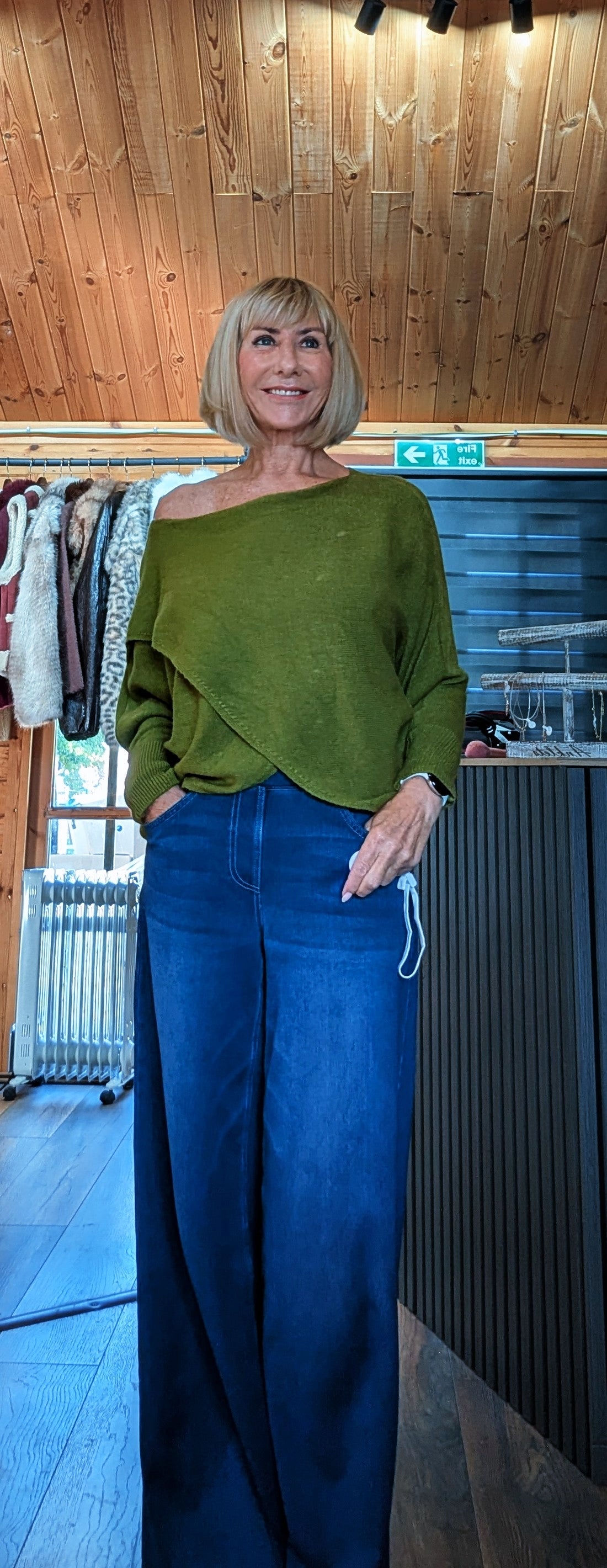 Pippa cashmere-blend crossover jumper in olive green styled by ditsydi with wide leg jeans