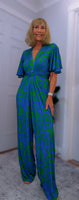 Justina Tropical Green - Fuchsia -Angel Sleeve Maxi Jumpsuit with Twist Detail