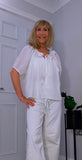 Clover White Silk Boho Blouse – Balloon Sleeves & Embroidered Floral Detail