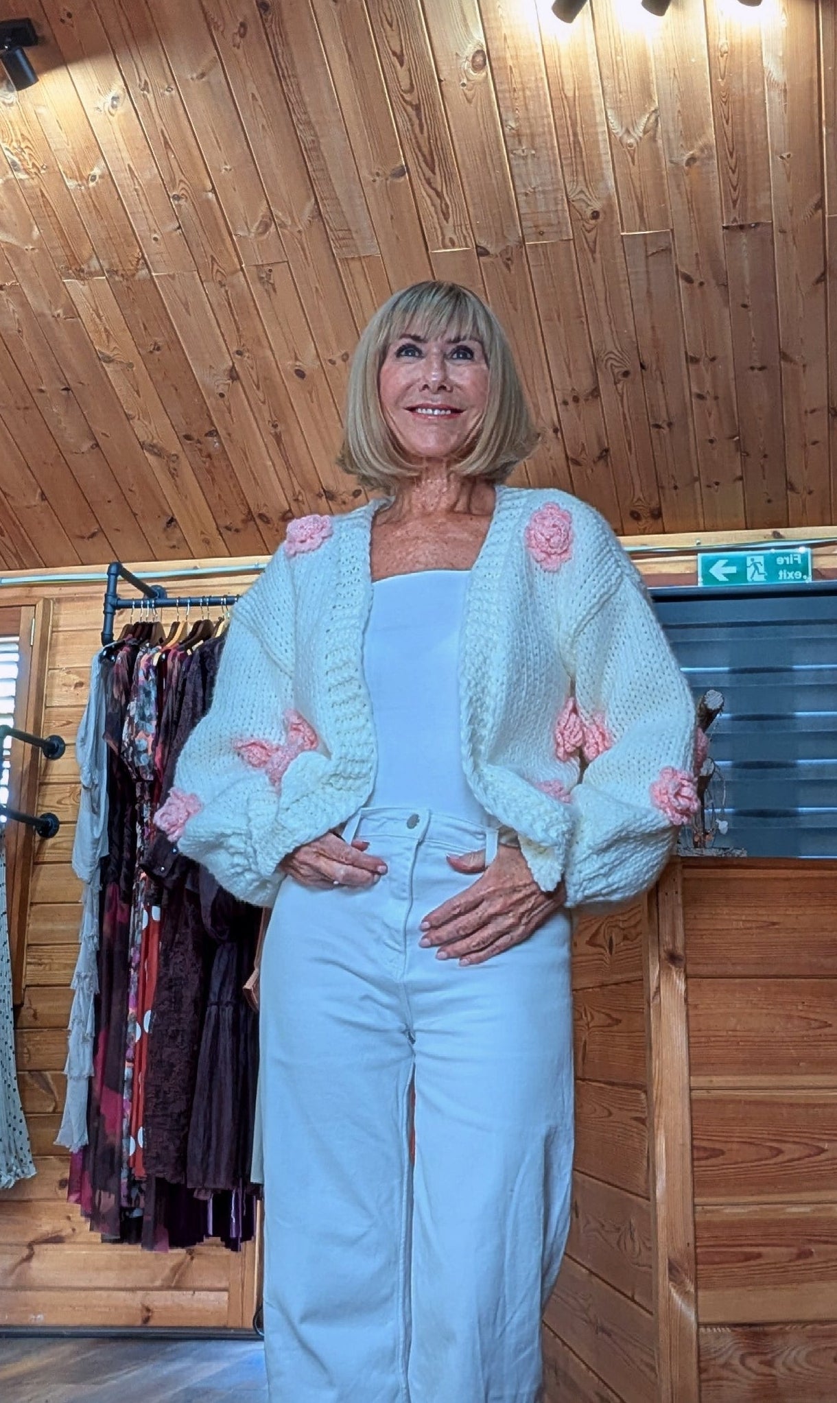 Cream knitted women’s cardigan with pink flower embellishments – Rose