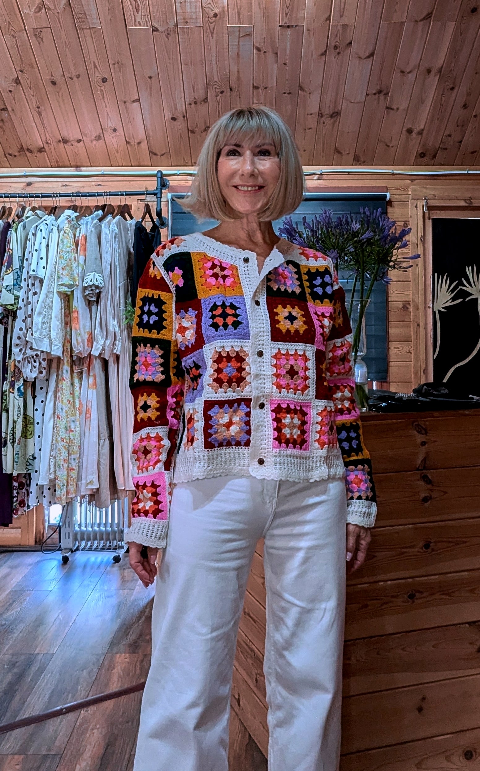 Tara Crocheted Multicoloured Cardigan worn with white high waisted jeans