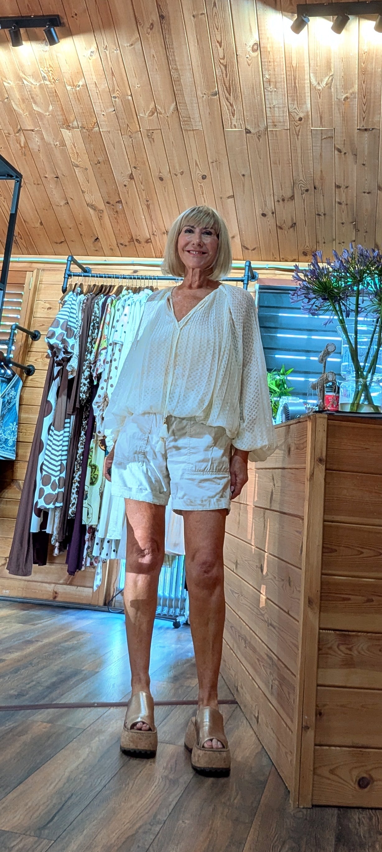 Side view of the Jasmine floral blouse, available in UK sizes 8–14.
