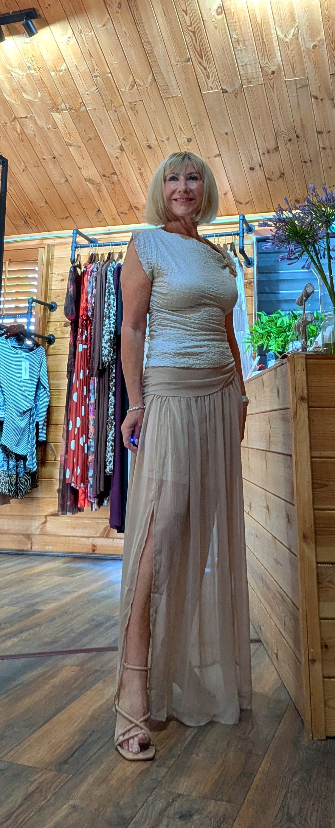 Side view of Tonia Boho Draped Waist Skirt lined to the knee with front split
