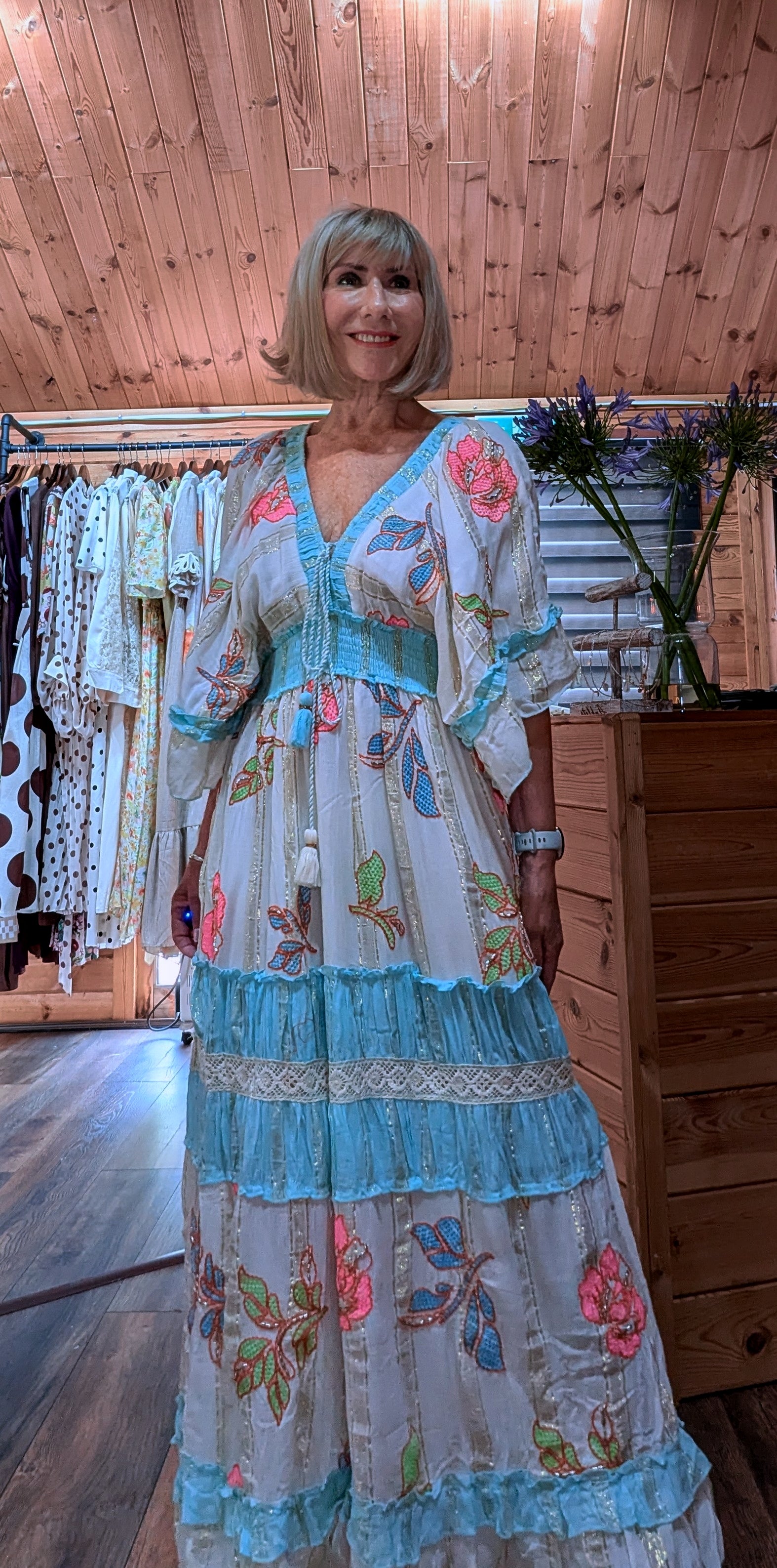 Lucy long floral summer dress featuring turquoise borders and delicate lace trim.