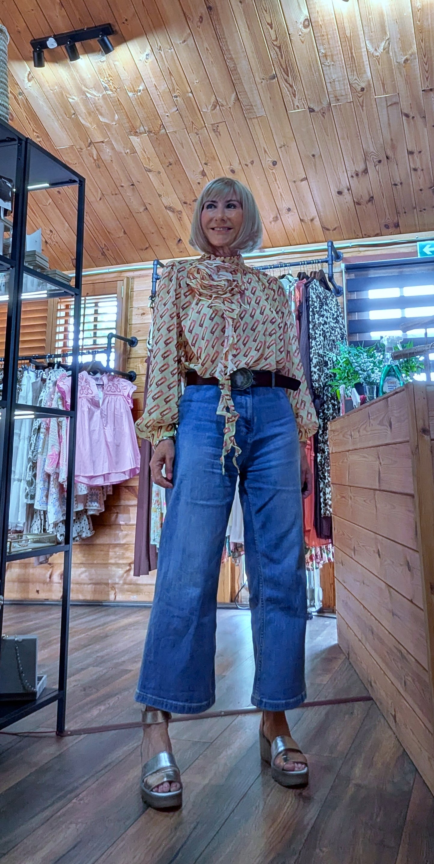Estelle cream blouse with oversized floral detailing and elegant puff sleeves
