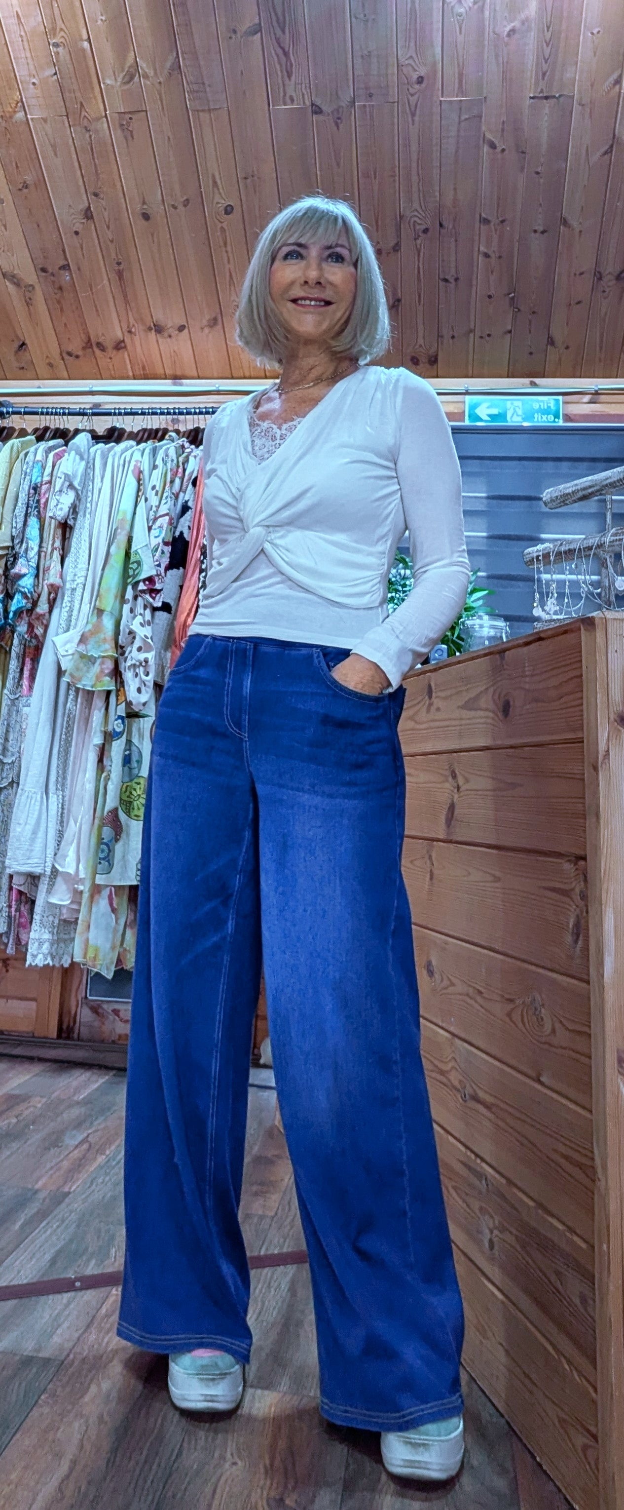 Lace neck top worn with jeans