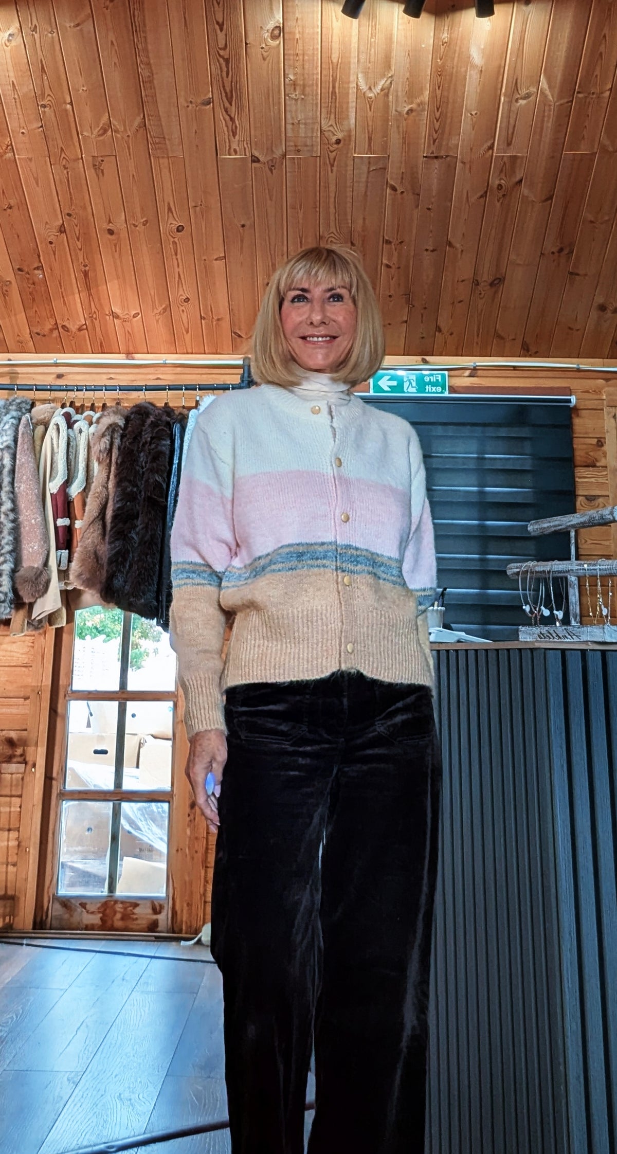 Helen knit cardigan showing cream and pink panels above a camel hem