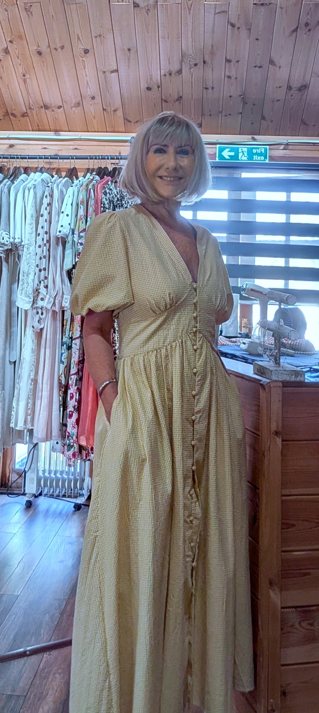Side view of Bethany Yellow Gingham Midi Dress  with short puff sleeves for summer