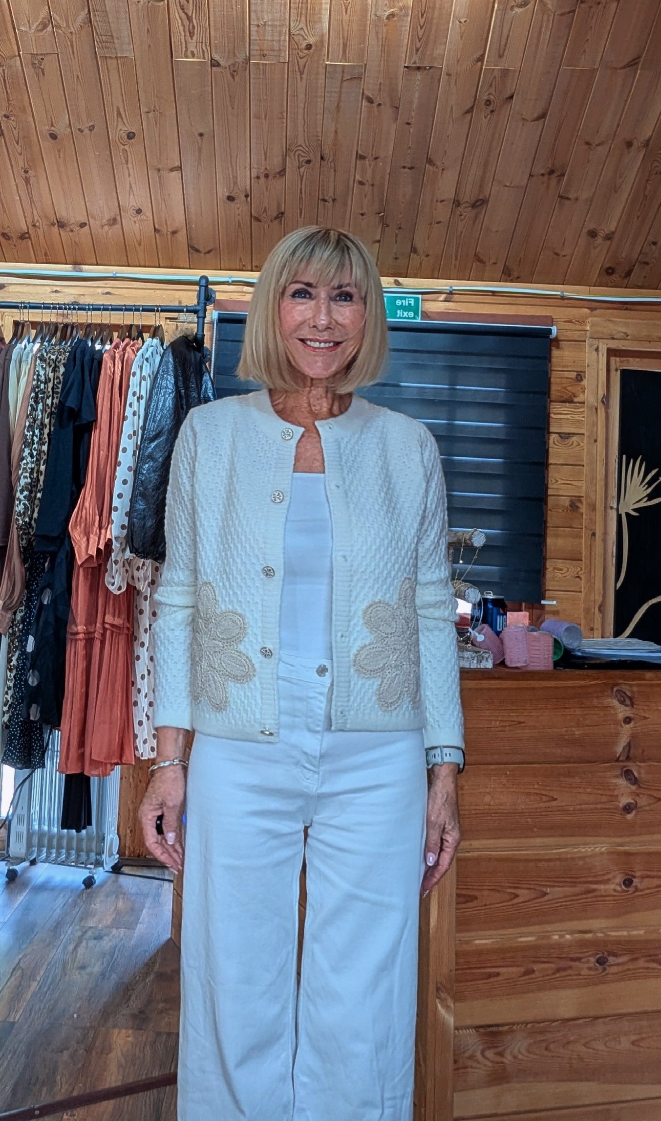 Soft ivory Aviary cardigan styled with white trousers, available at DitsyDi.