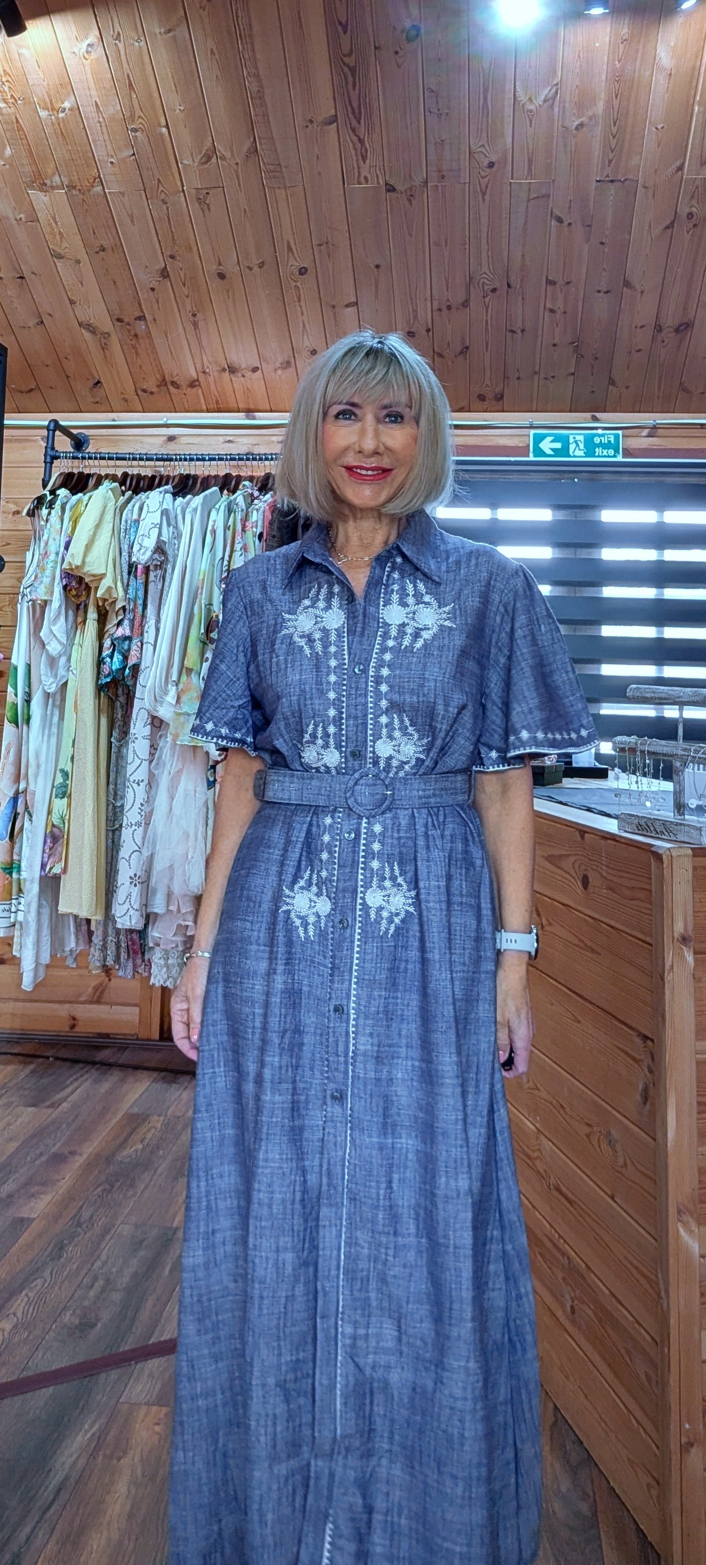 Blue shirt dress with white embroidery