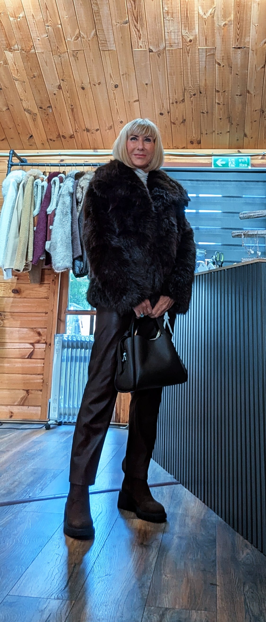 Women’s chocolate-brown faux fur jacket with long sleeves