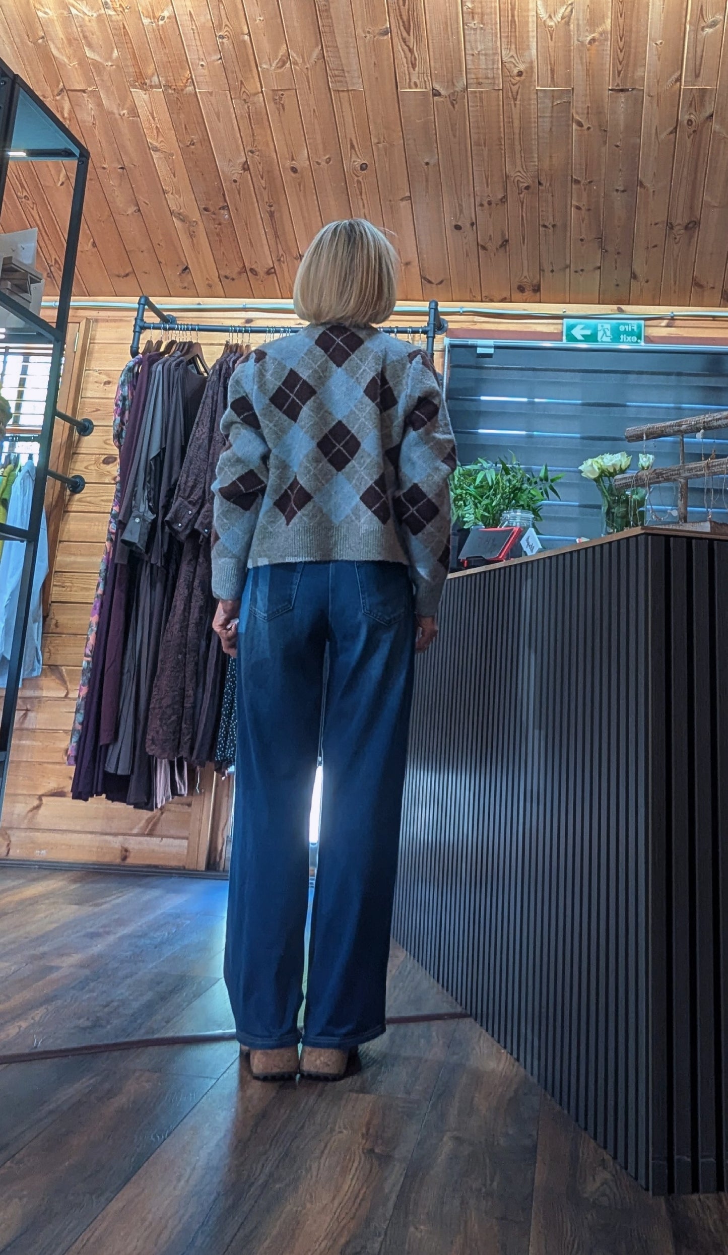 Magna knitted cardigan styled with  wide leg jeans