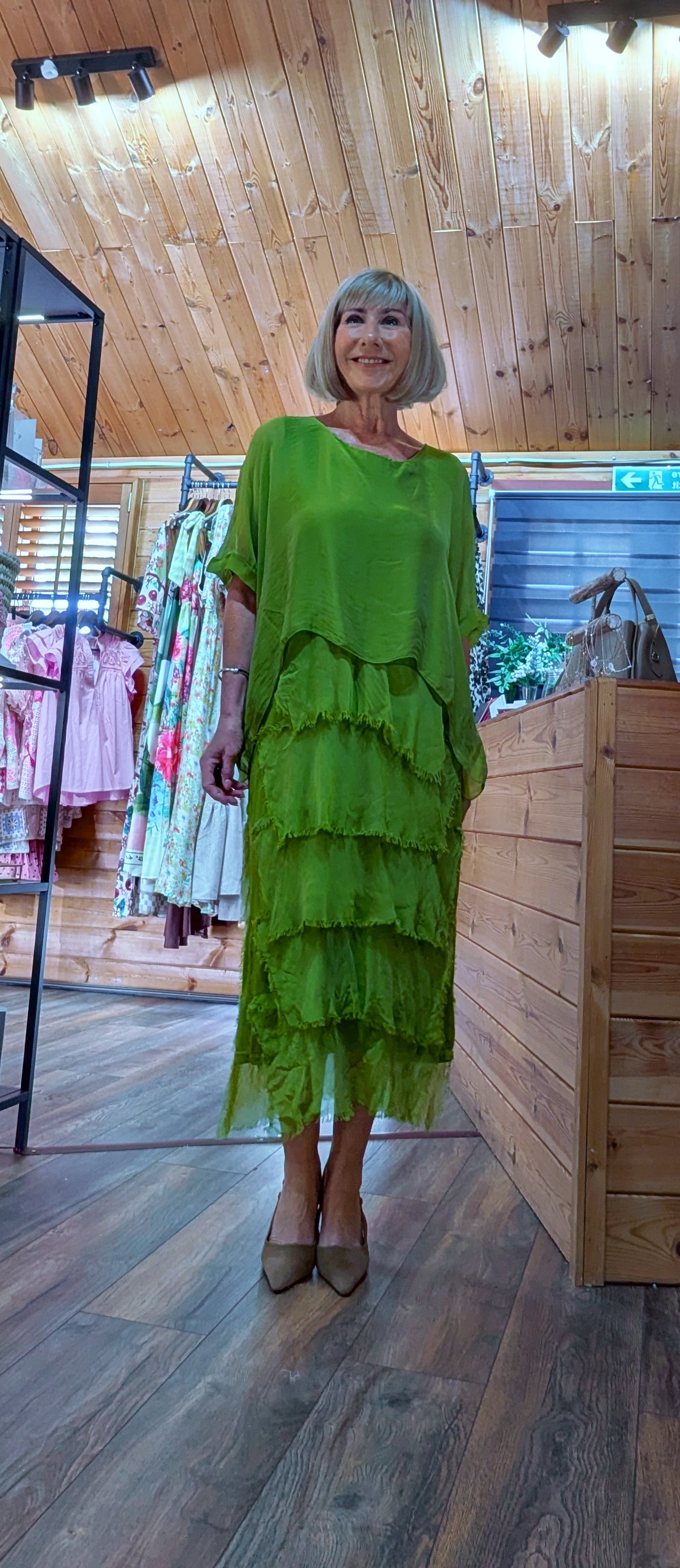 Layered occasion dress in green fully lined and feminine