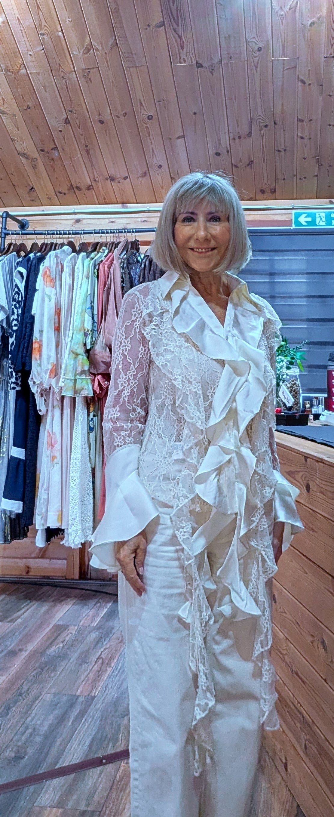 Statement ivory lace blouse with ruffle and frill detail