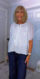 Clover White Silk Boho Blouse – Balloon Sleeves & Embroidered Floral Detail