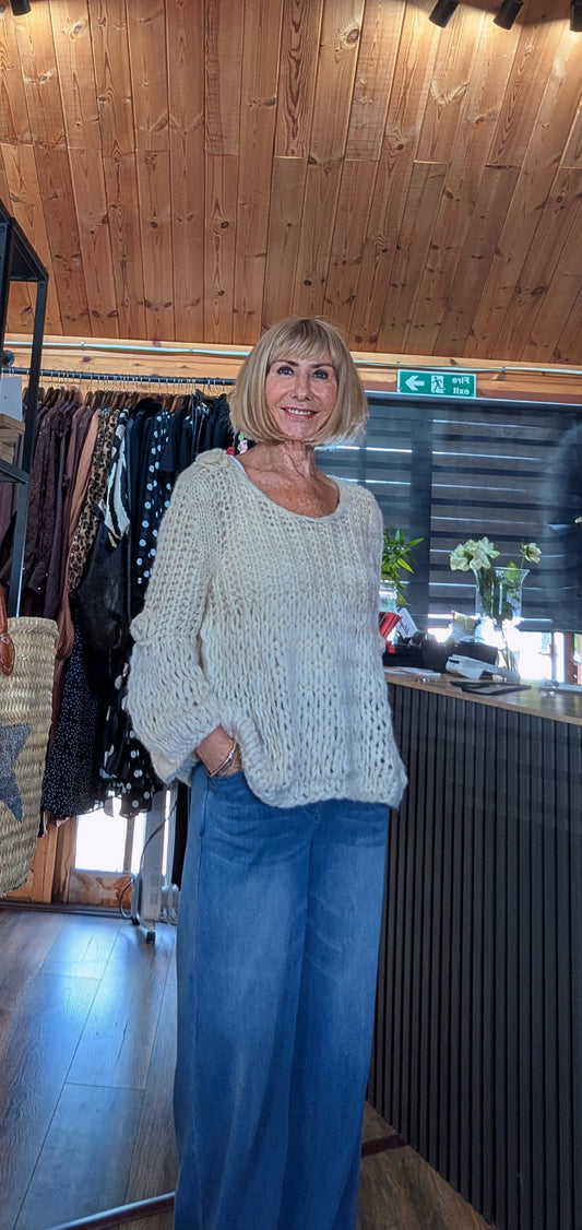 Women’s handmade open knit jumper in soft cream