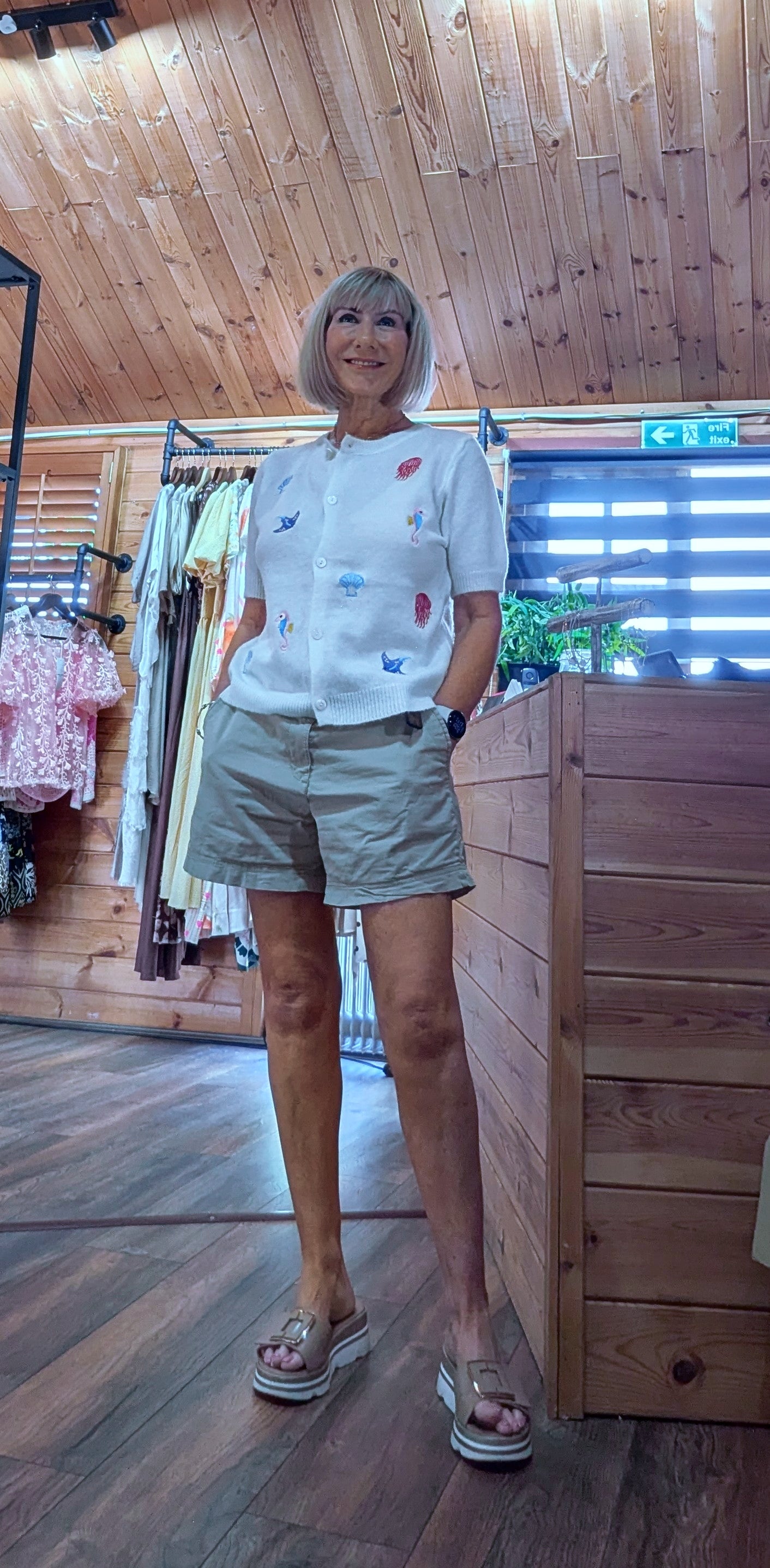 White short sleeved summer cardigan with colourful embroidery