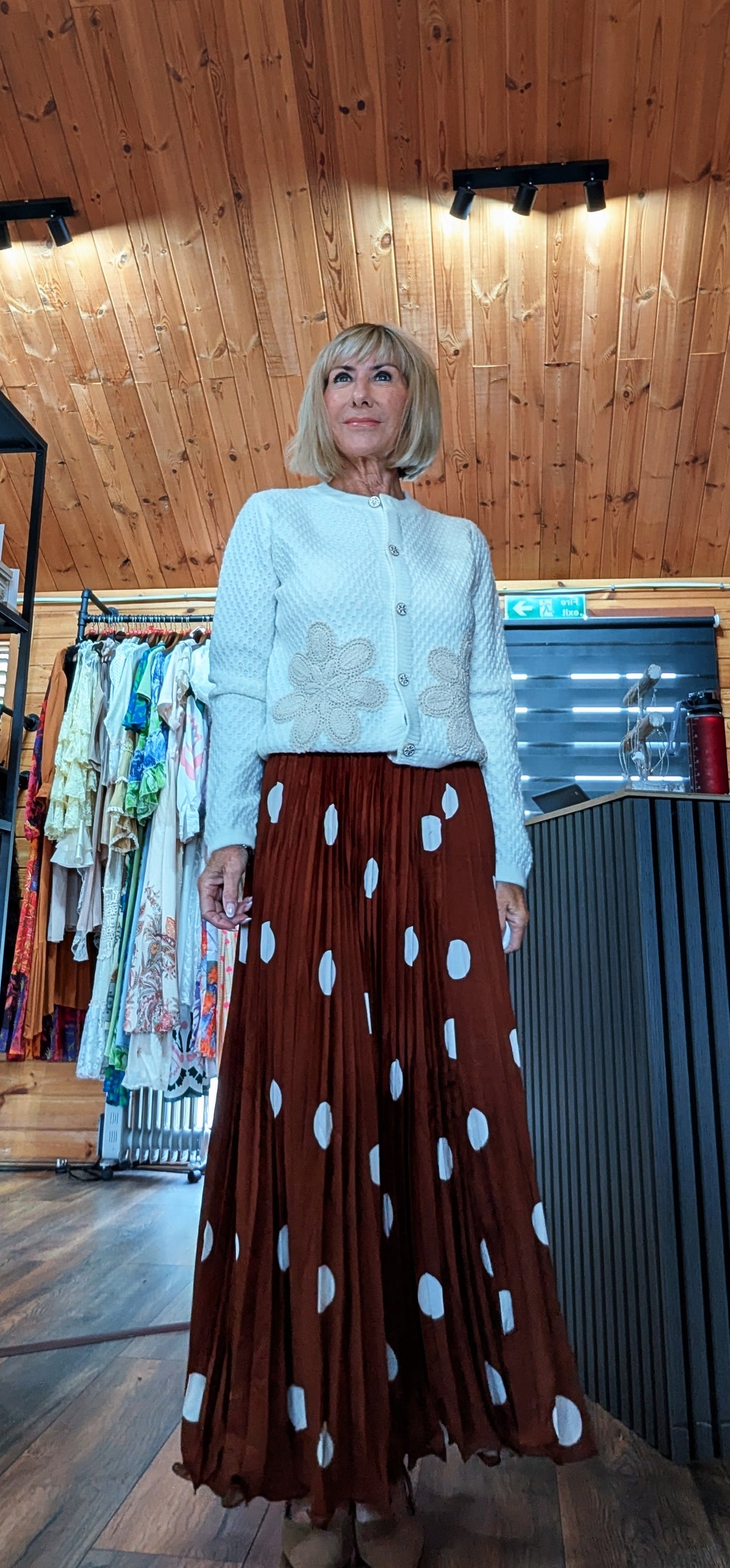 Front view of Trinny polka dot pleated maxi skirt uk boutique