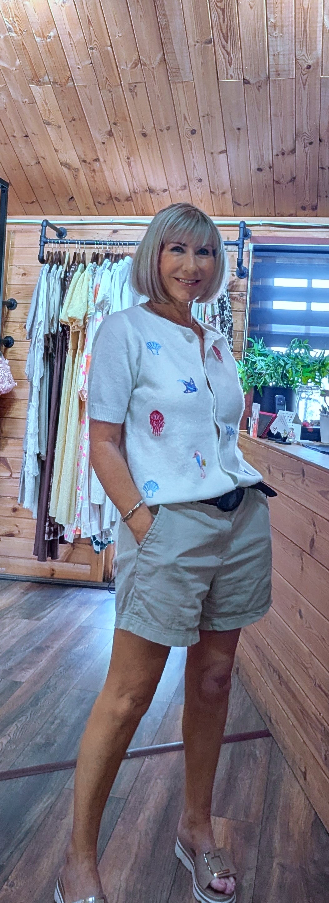 Marigold Embroidered Sea Cardigan – White worn with bermuda shorts UK