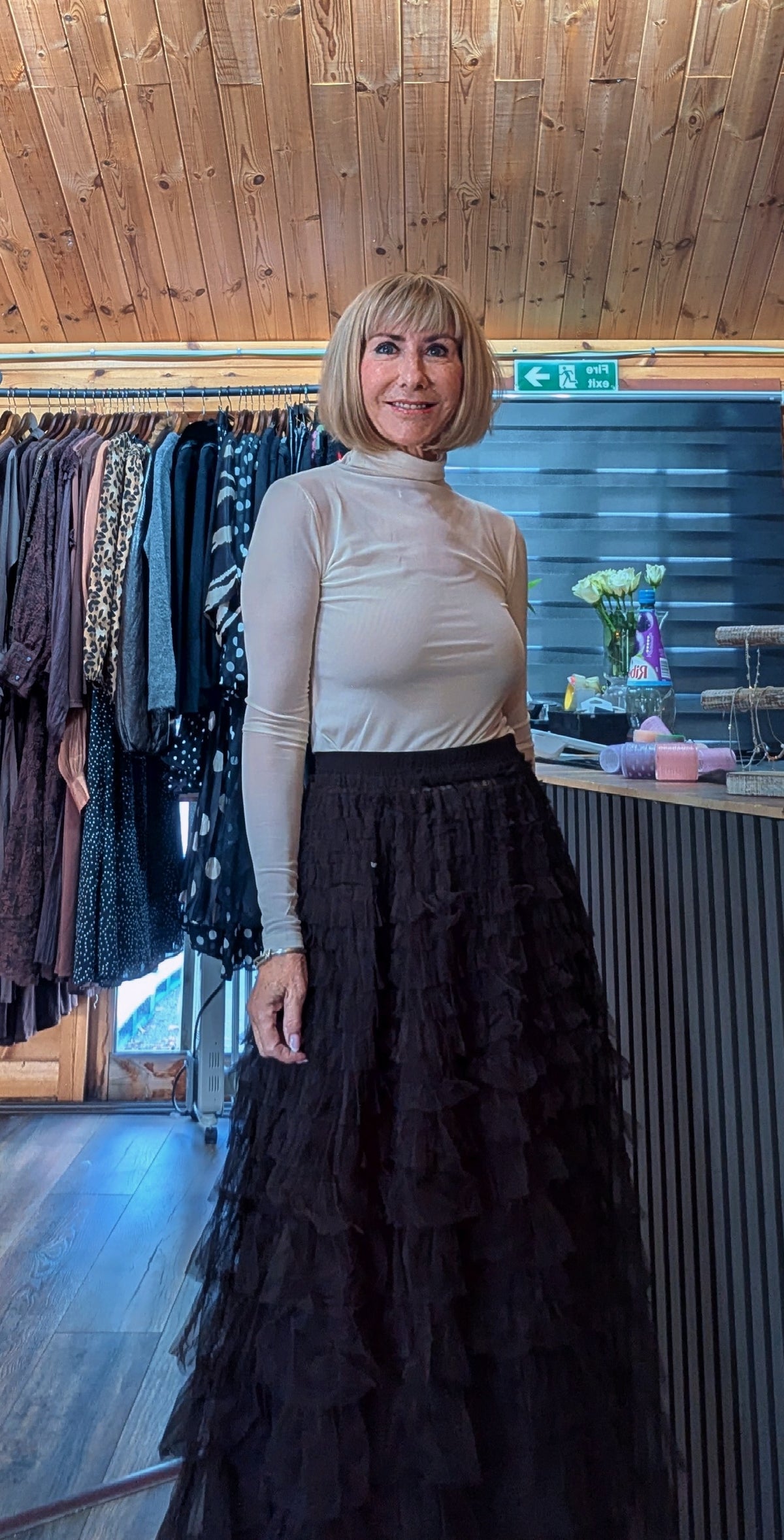 Tulle skirt in a rich chocolate with elasticated waist band worn ith an Ecru sheer top with a roll neck 