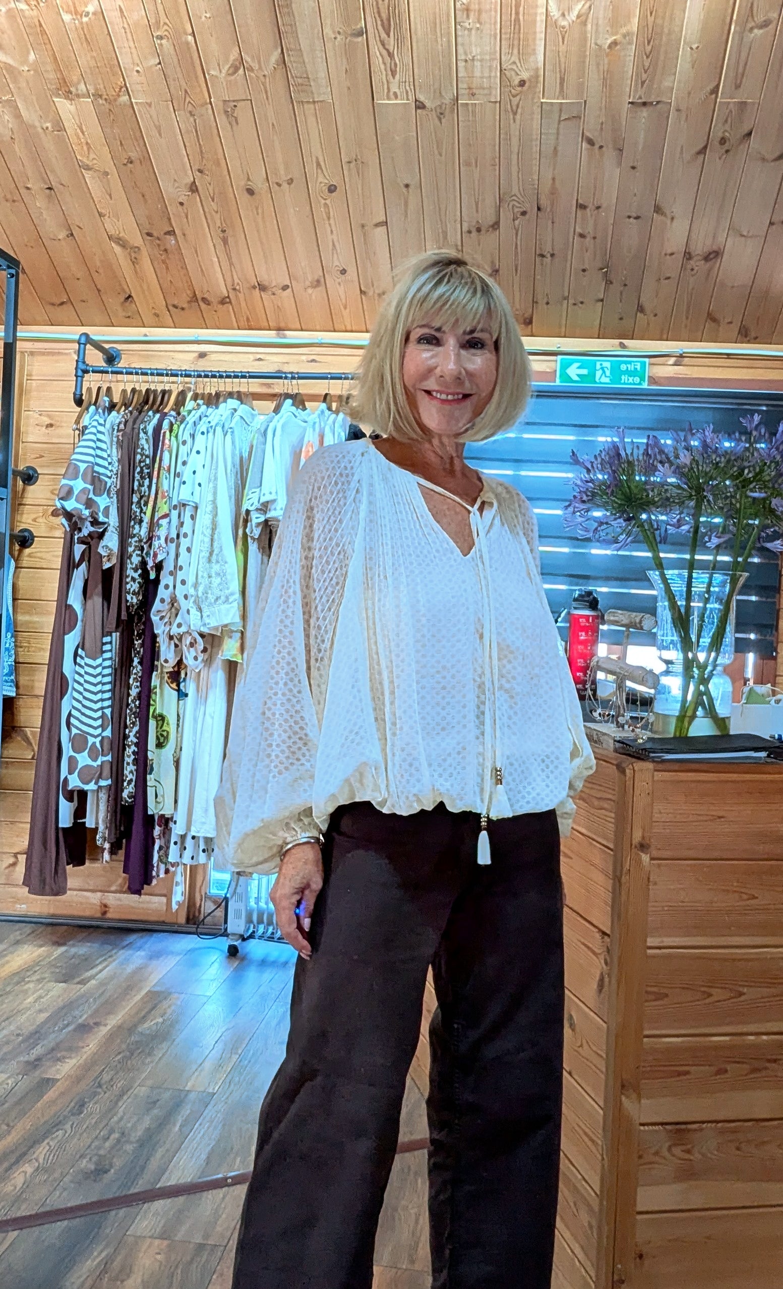 Close-up of the Jasmine blouse showing the floral print and soft viscose fabric.