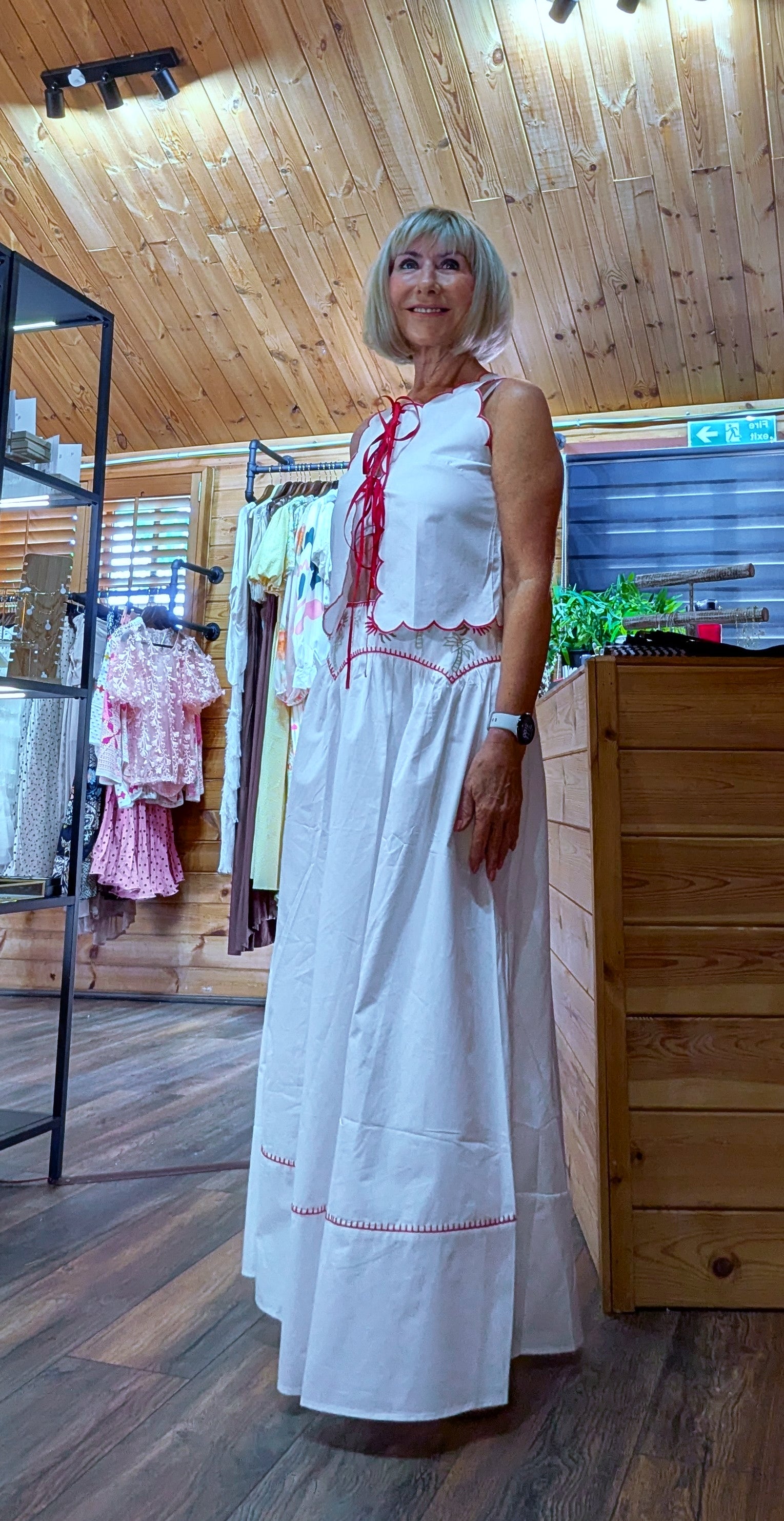 Side profile of the Iris cotton co-ord showing the flattering fit, breathable fabric and elegant embroidered detailing.