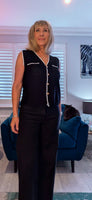 Genevieve Black Sleeveless Cardigan with White Border & Gold Buttons