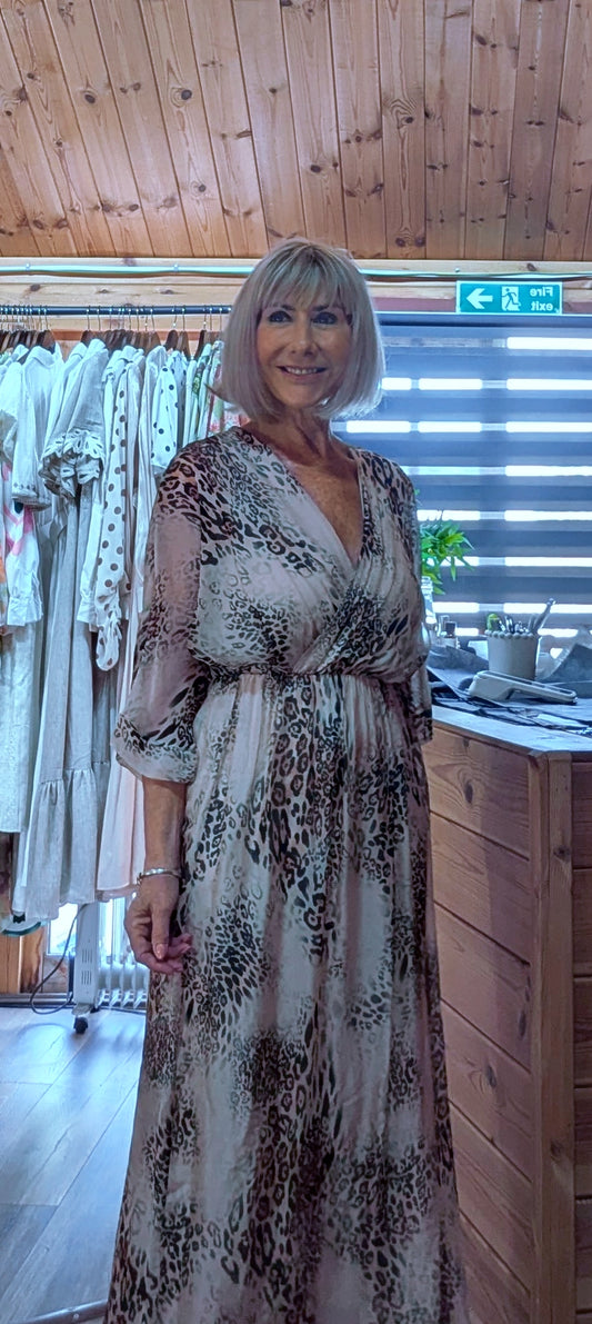leopard print silk blend maxi dress with a flattering wrap-style bodice, V-neckline and flowing skirt. One size fits UK 8–14.
