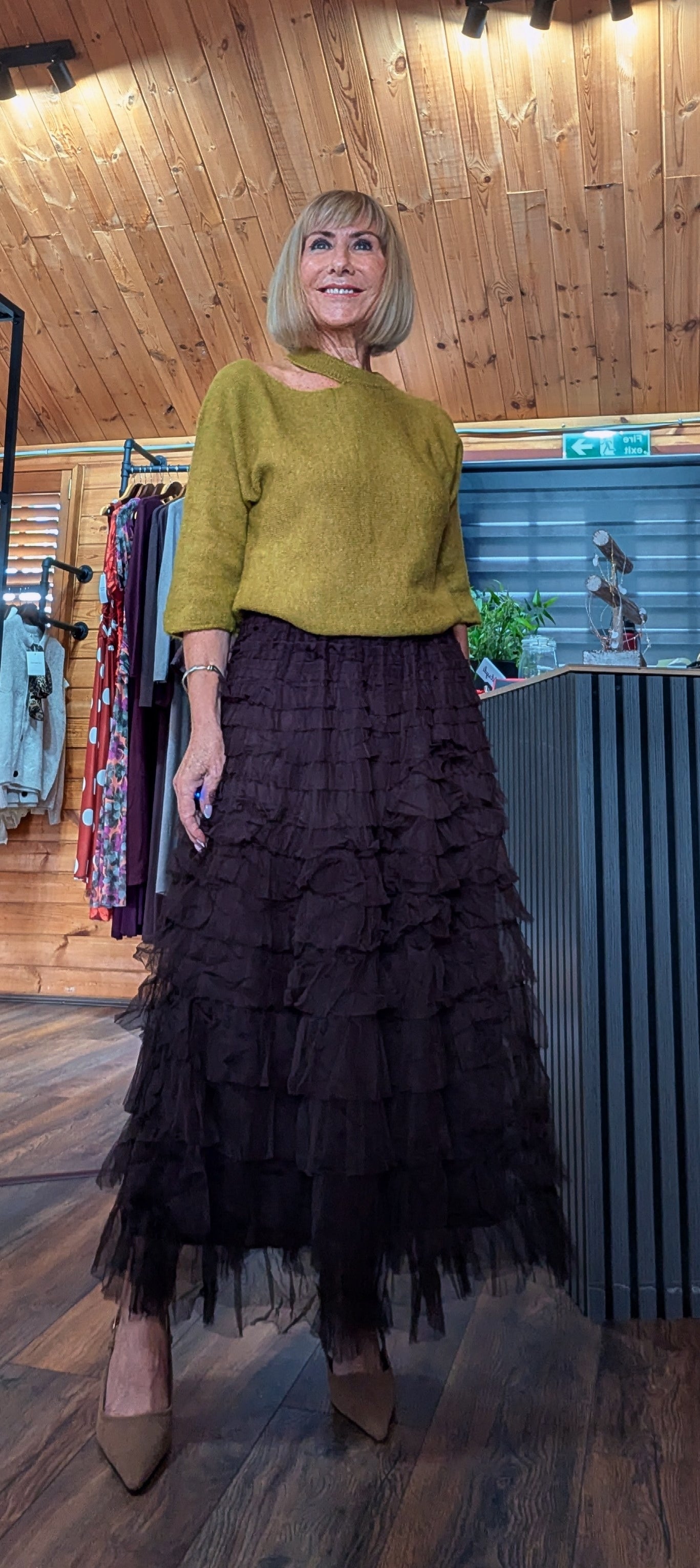 Women’s elegant tulle skirt with statement layered design close up view
