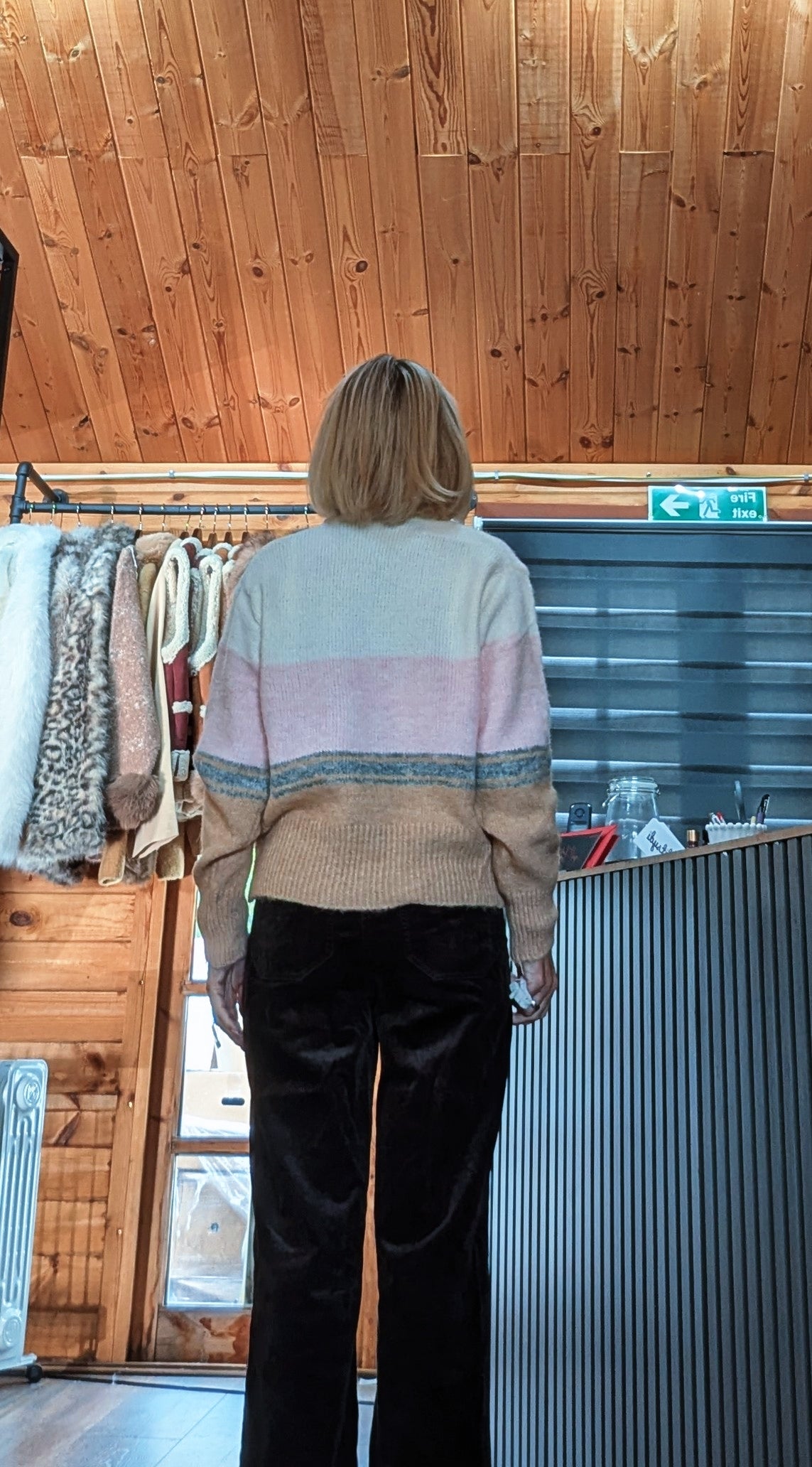Back view of Helen cardigan showing cream, pink and camel colour blocks with a grey stripe