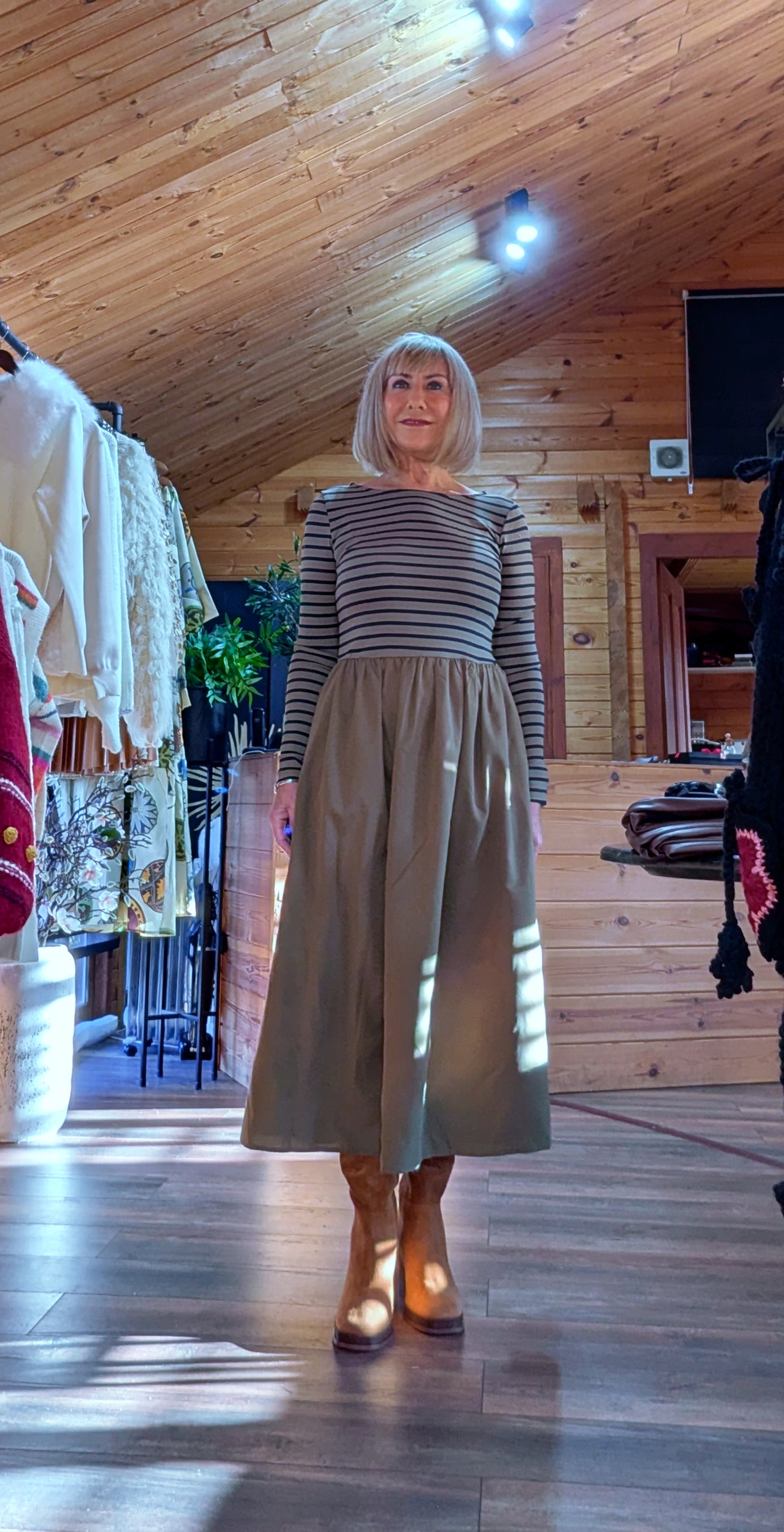 Olive green midi dress with striped top and flared skirt