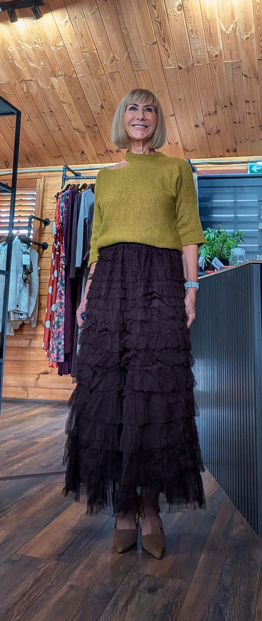 Women’s chocolate tulle maxi skirt with full flowing silhouette worn with Toni wool blend sweater
