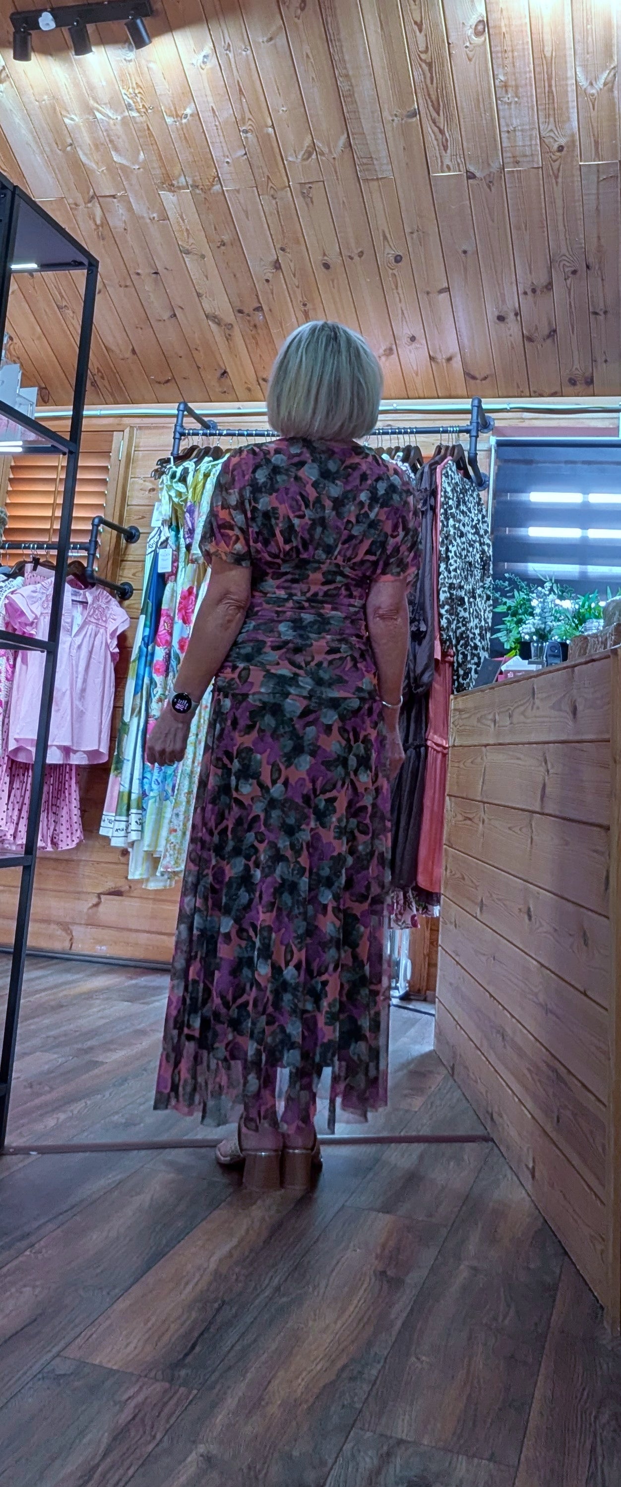 Rear view Emilie floral drape maxi dress with ruched waist
