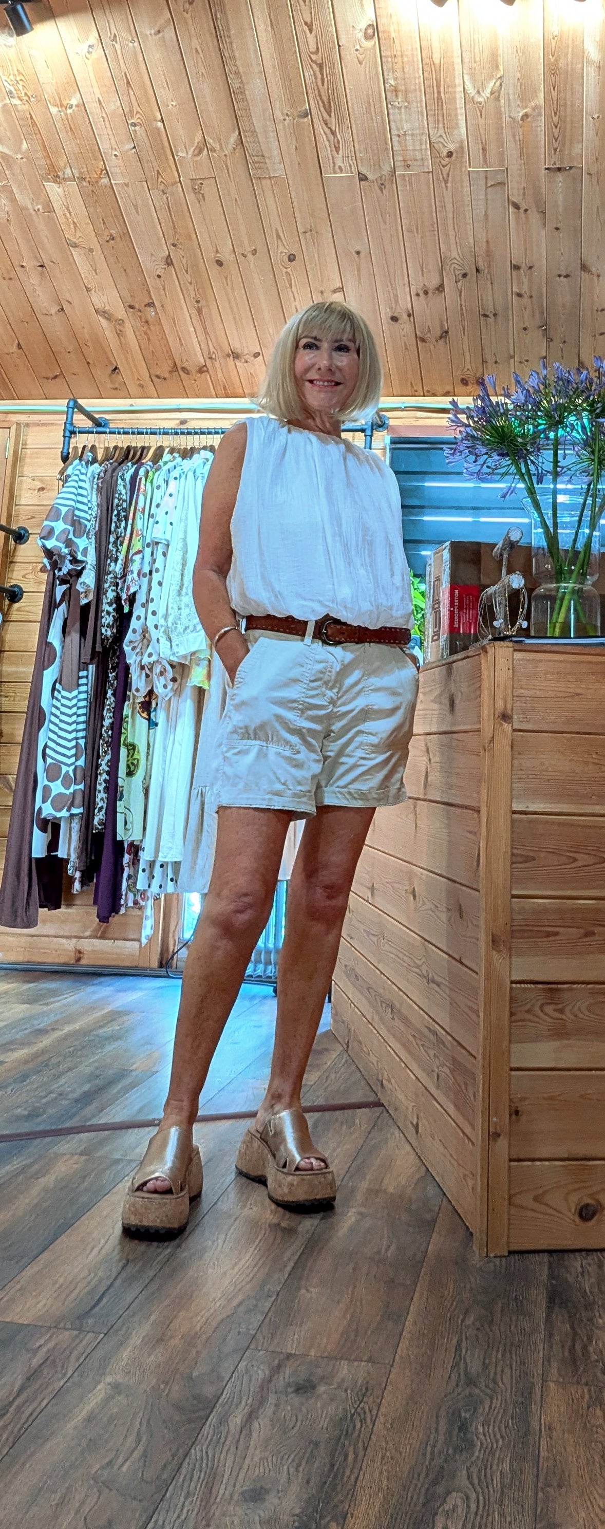 Front view of the Francis cotton bubble-hem blouse with a round neckline.