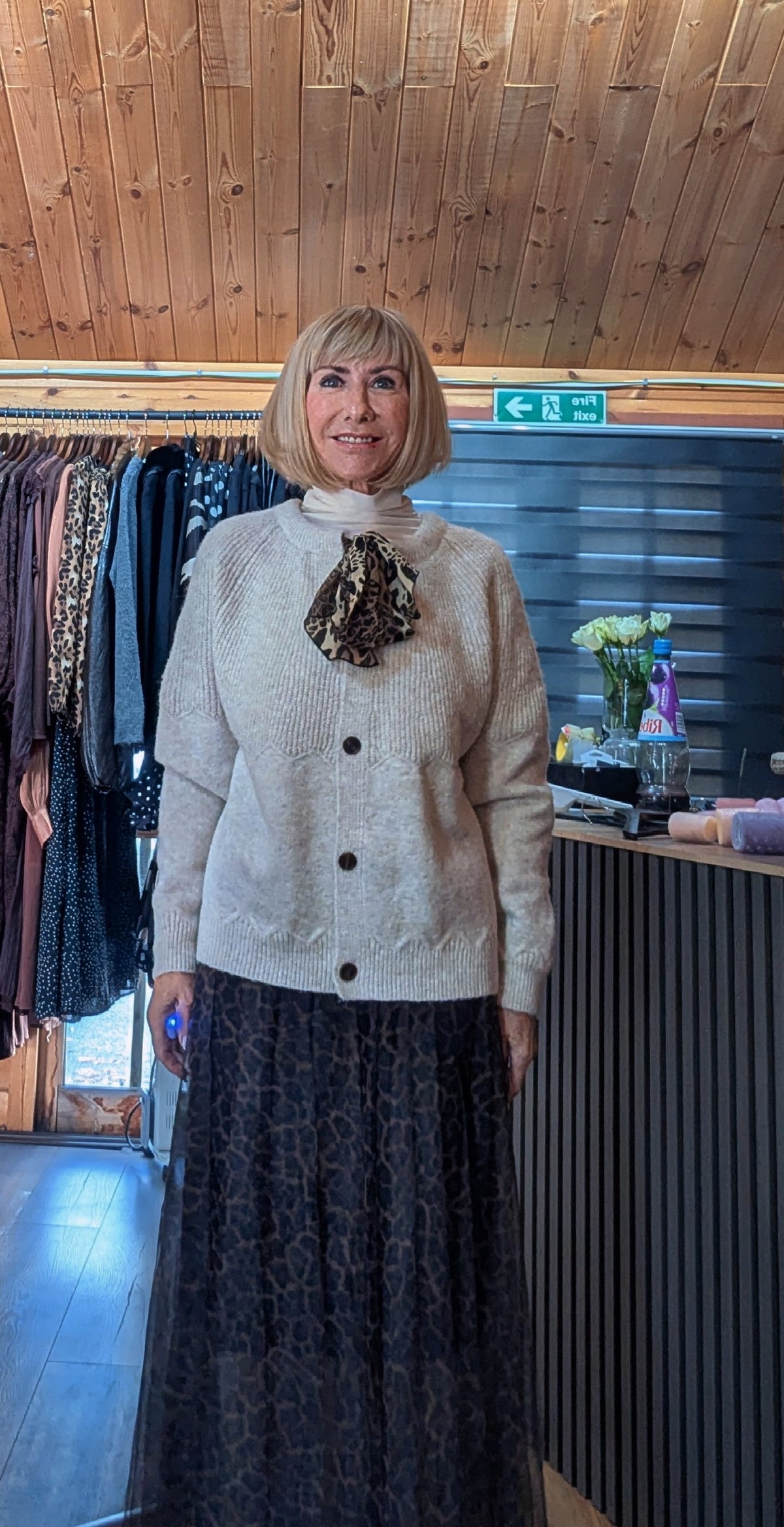 Women’s neutral cardigan with animal print neck bow