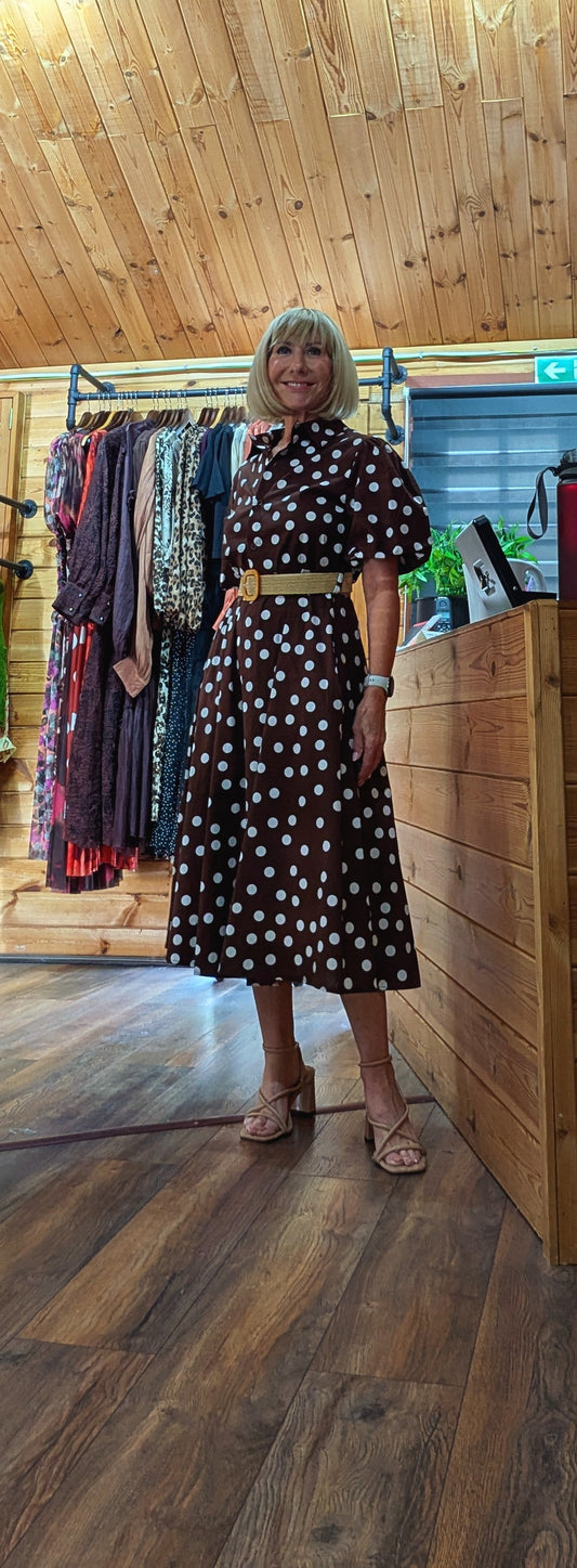 Aoife brown and white polka-dot midi dress with short flared sleeves and a button front.