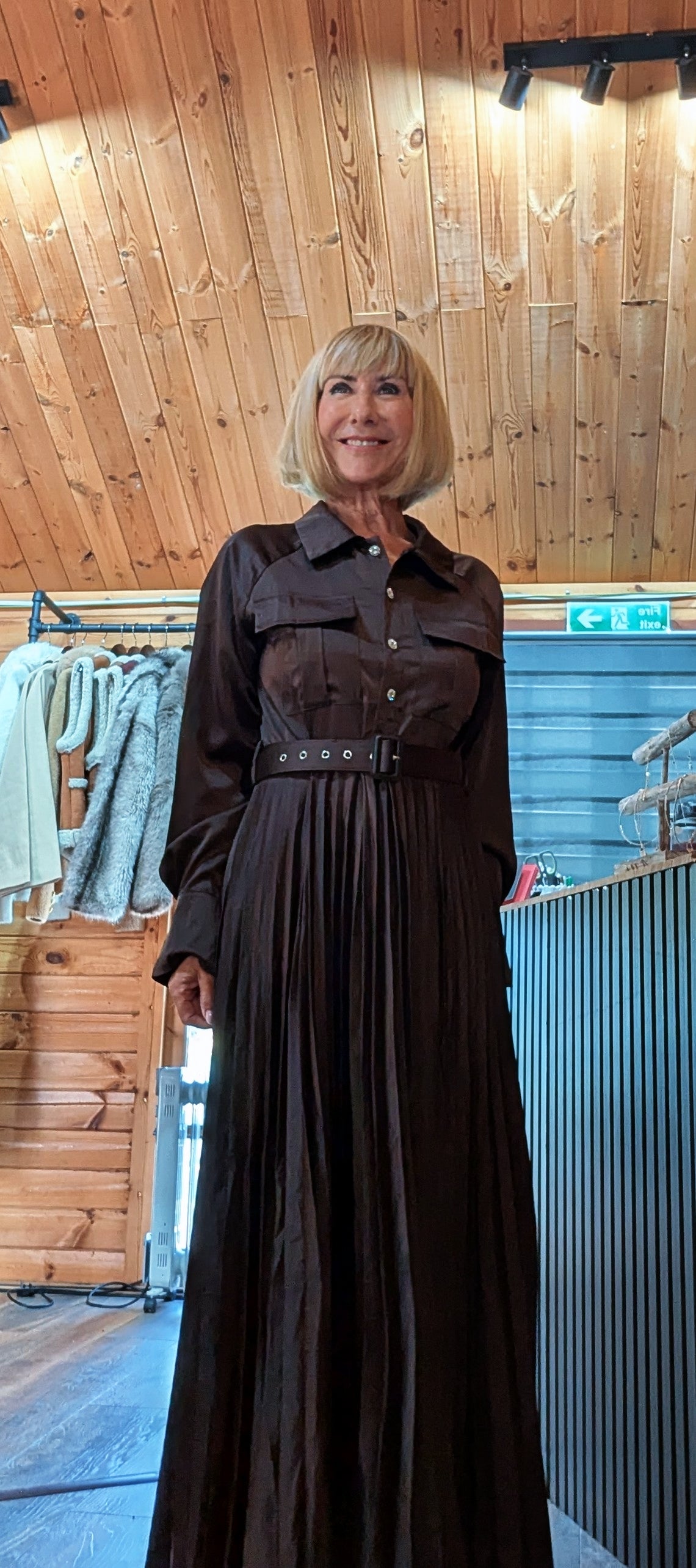 Close-up of the Meryl chocolate shirt dress with collar, buttons and statement pockets
