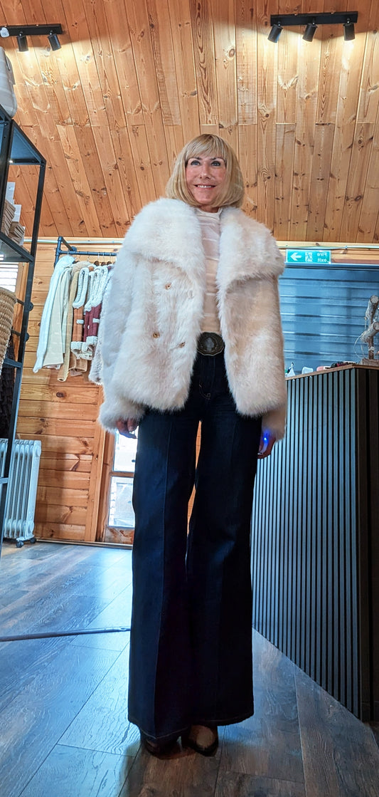 Guinivere ivory faux fur jacket with an oversized collar and button front
