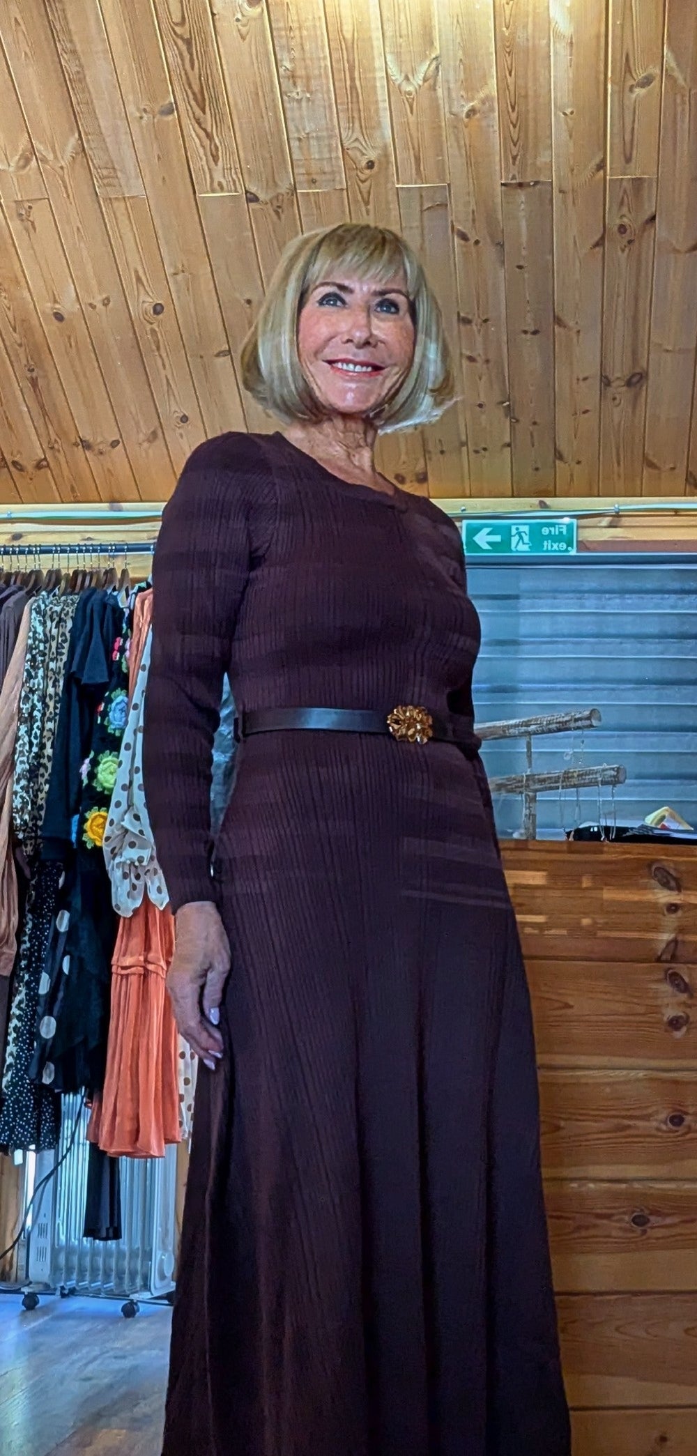 Women’s chocolate midi dress with long sleeves and gold buckle belt