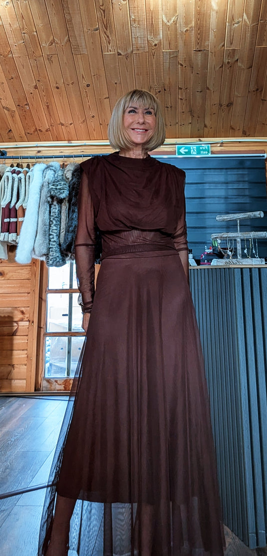 Harlow chocolate skirt set showing the draped high-neck top and long sheer sleeves