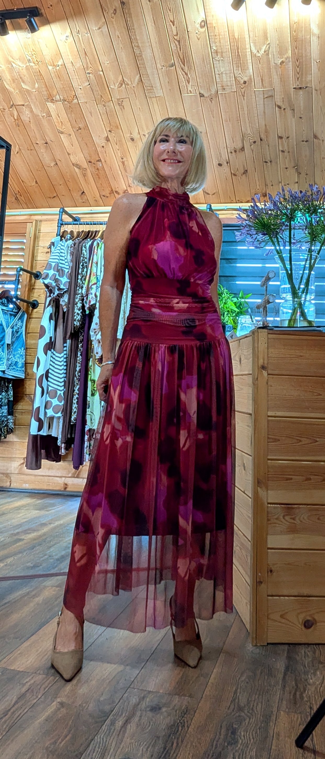 Natasha Floral Halter Maxi Dress Fuchsia worn with heels for special occasions