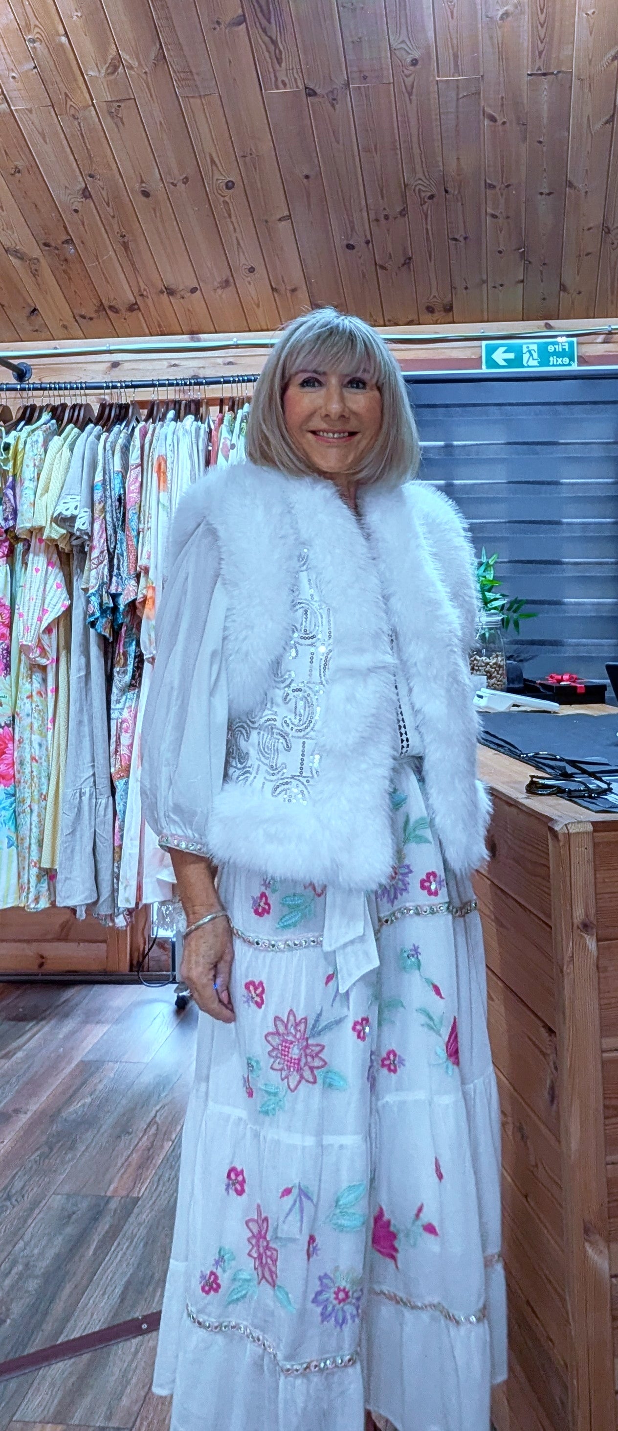 Close up view of Goldie White Sequin Faux Fur Gilet  