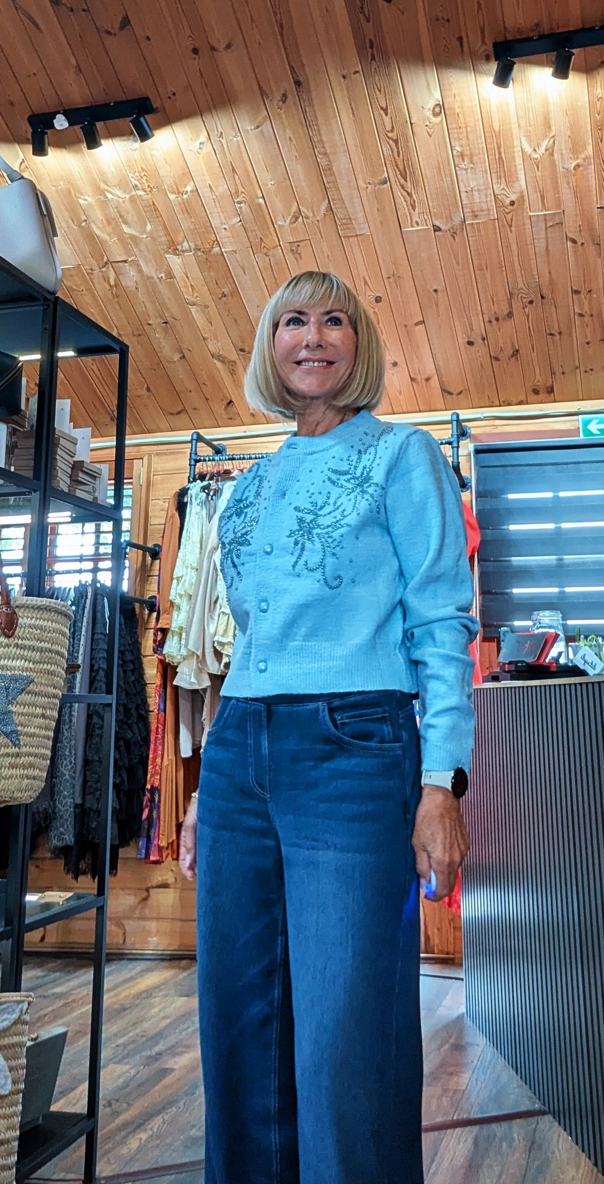 Close up of embroidered and beaded cardigan for women