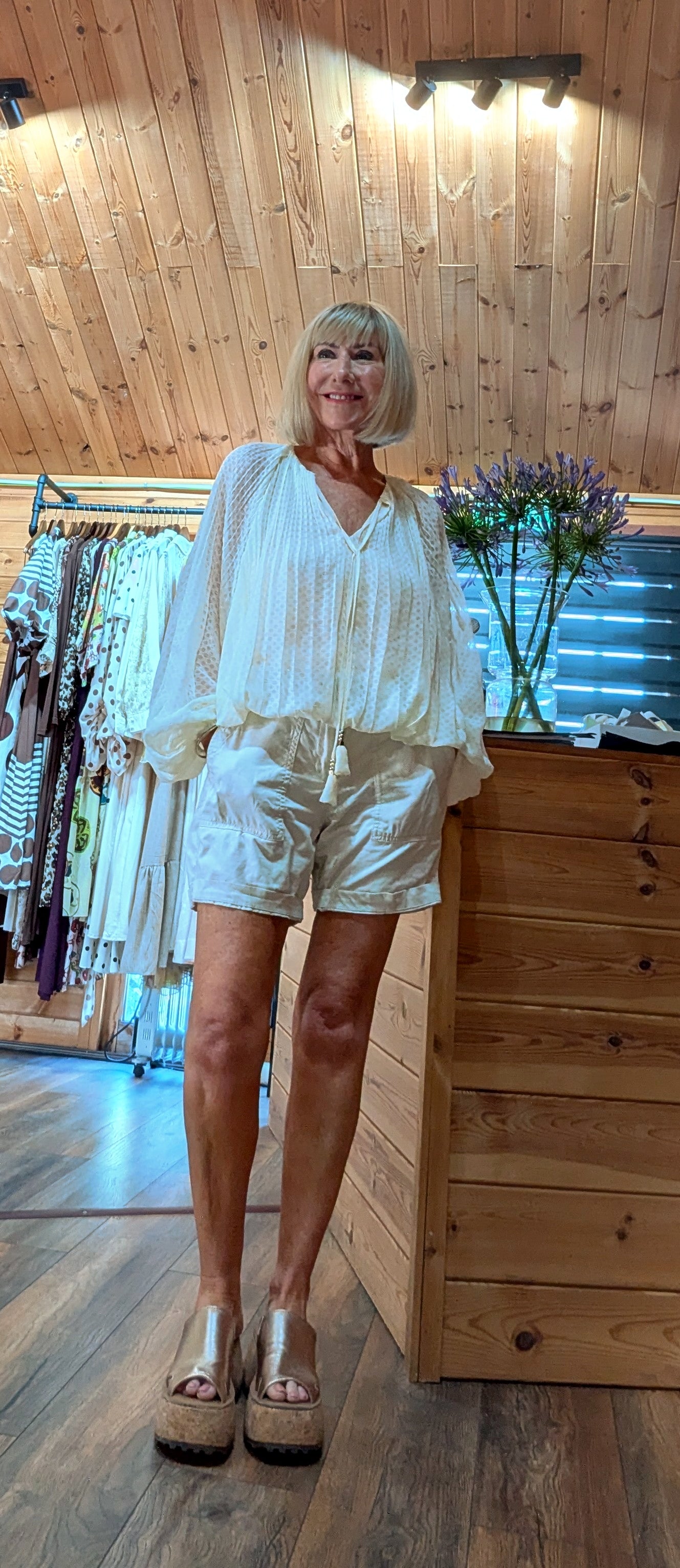 Jasmine floral viscose bubble-hem  blouse with a relaxed fit and soft draping.