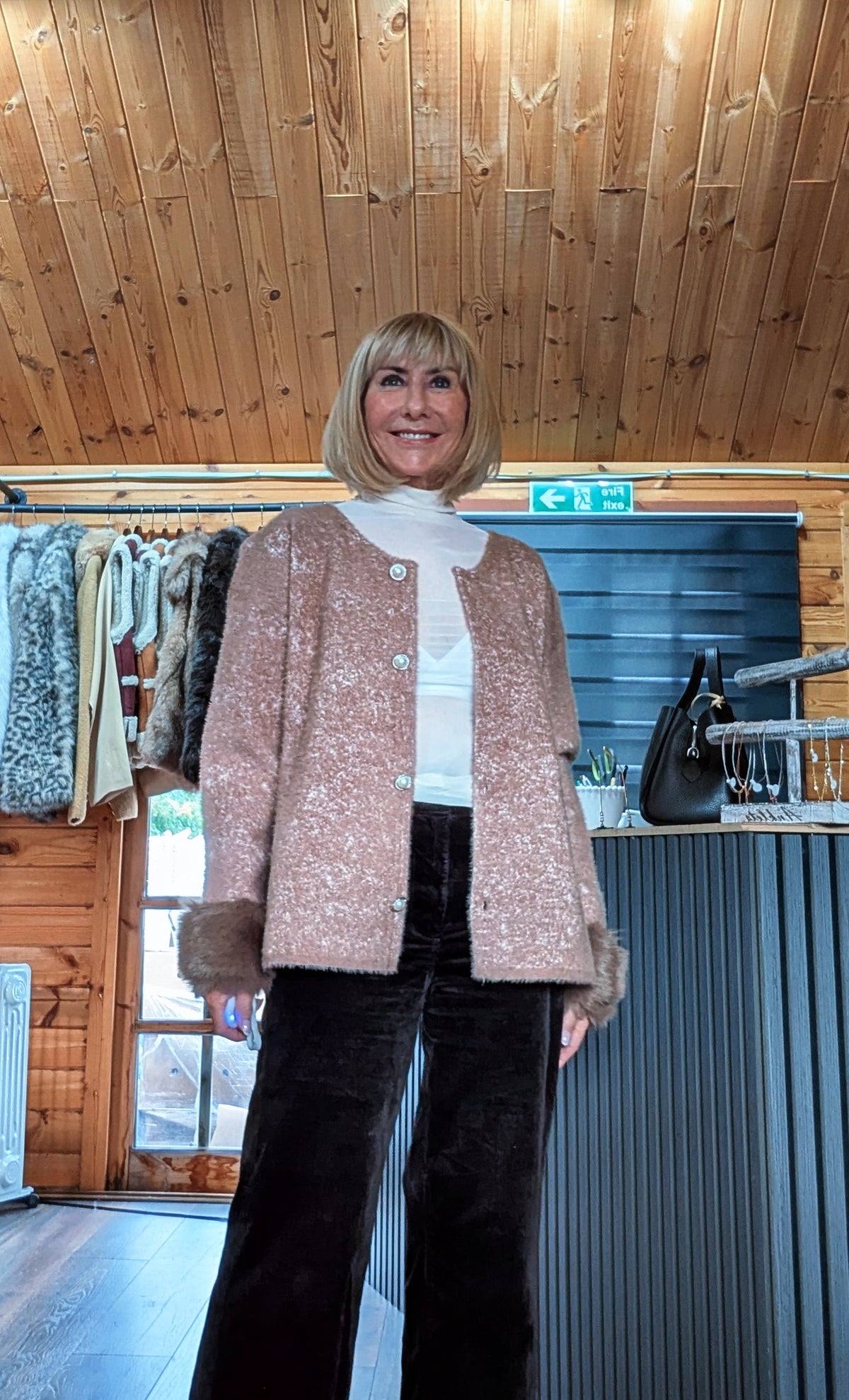 Front view of Liv chocolate cardigan showing the button detailing and long sleeves