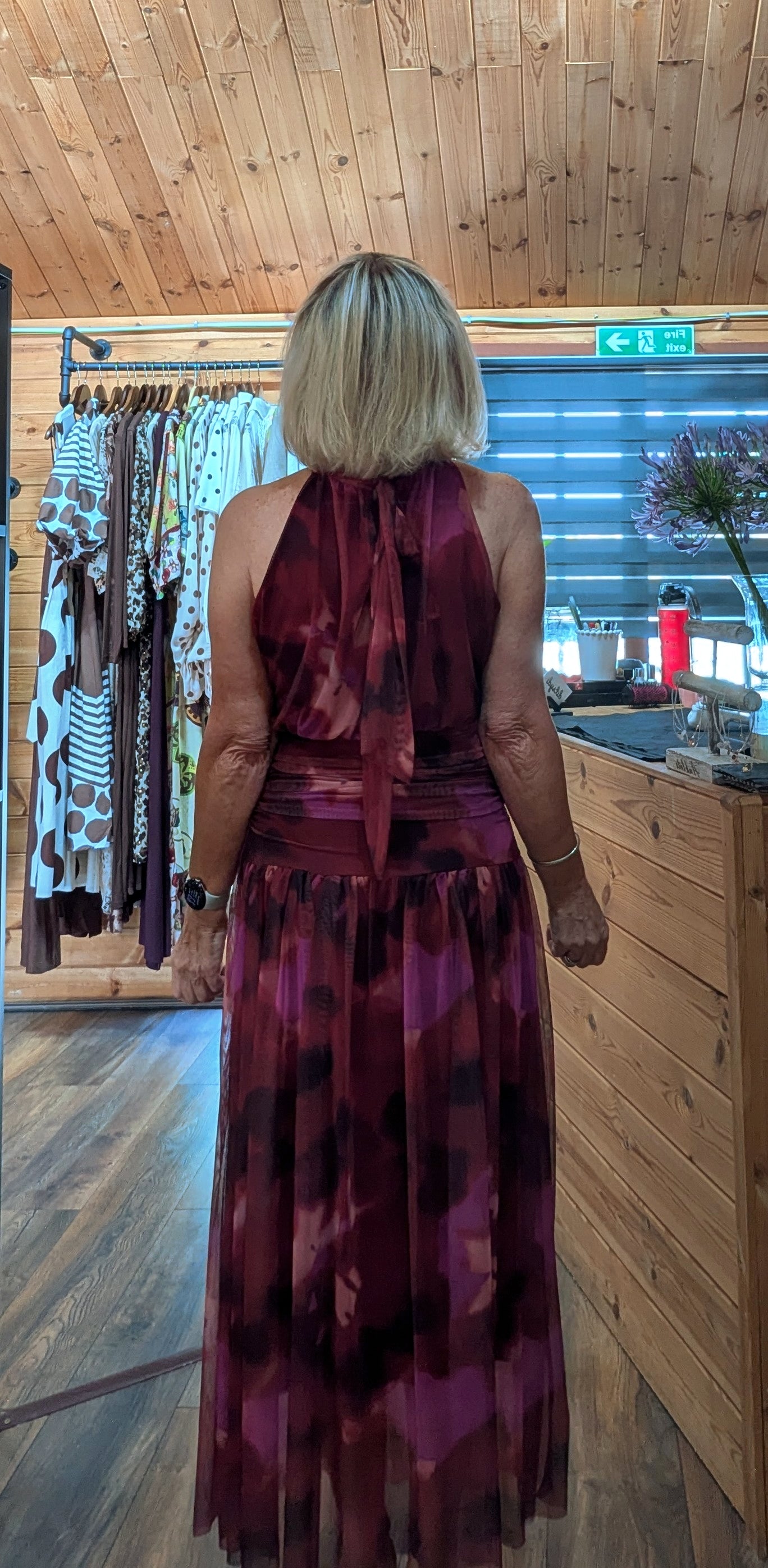 Rear view of Natasha floaty high neck dress with ties and tulle skirt 