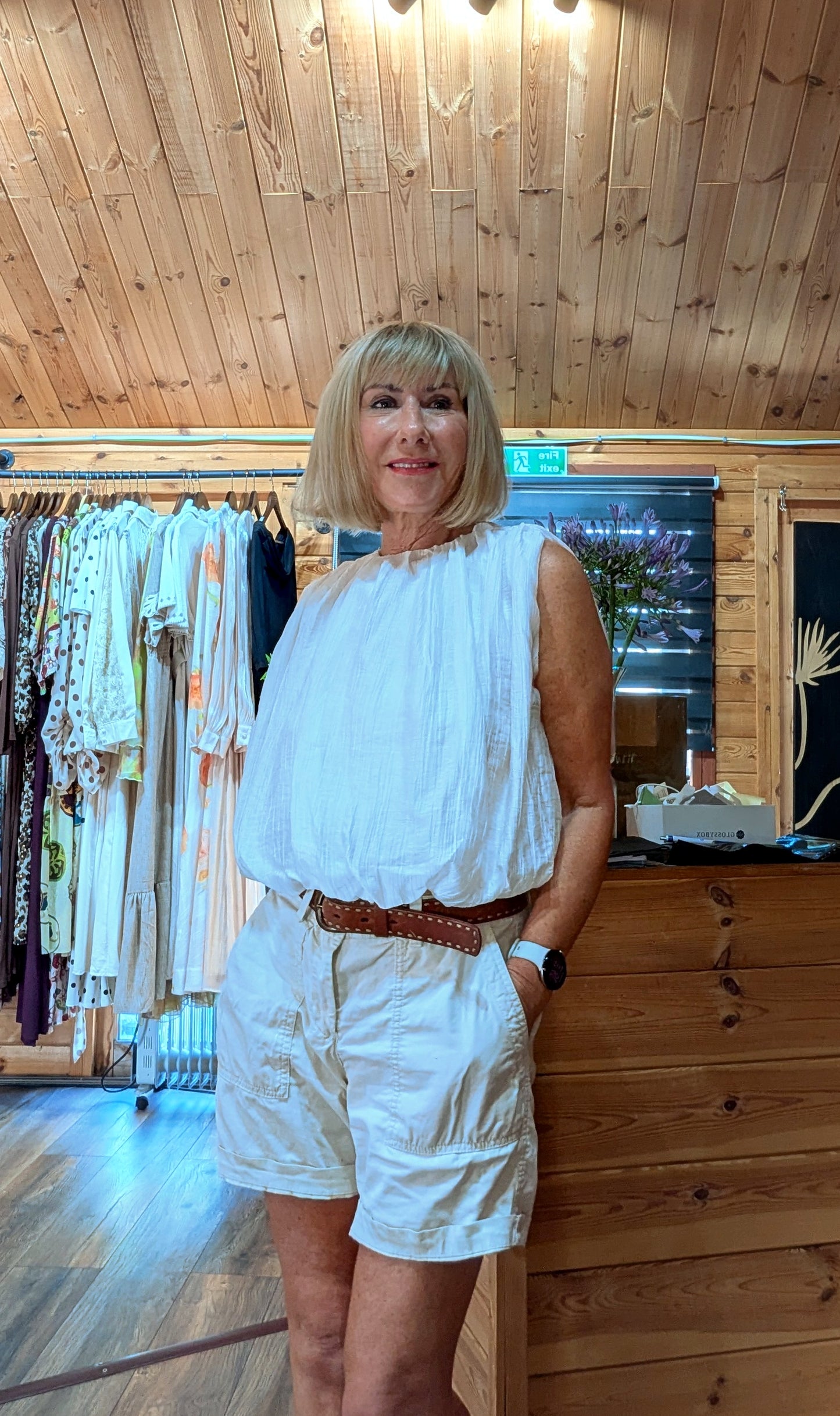 Francis white cotton sleeveless blouse with a relaxed bubble hem.