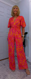 Justina Tropical Green - Fuchsia -Angel Sleeve Maxi Jumpsuit with Twist Detail